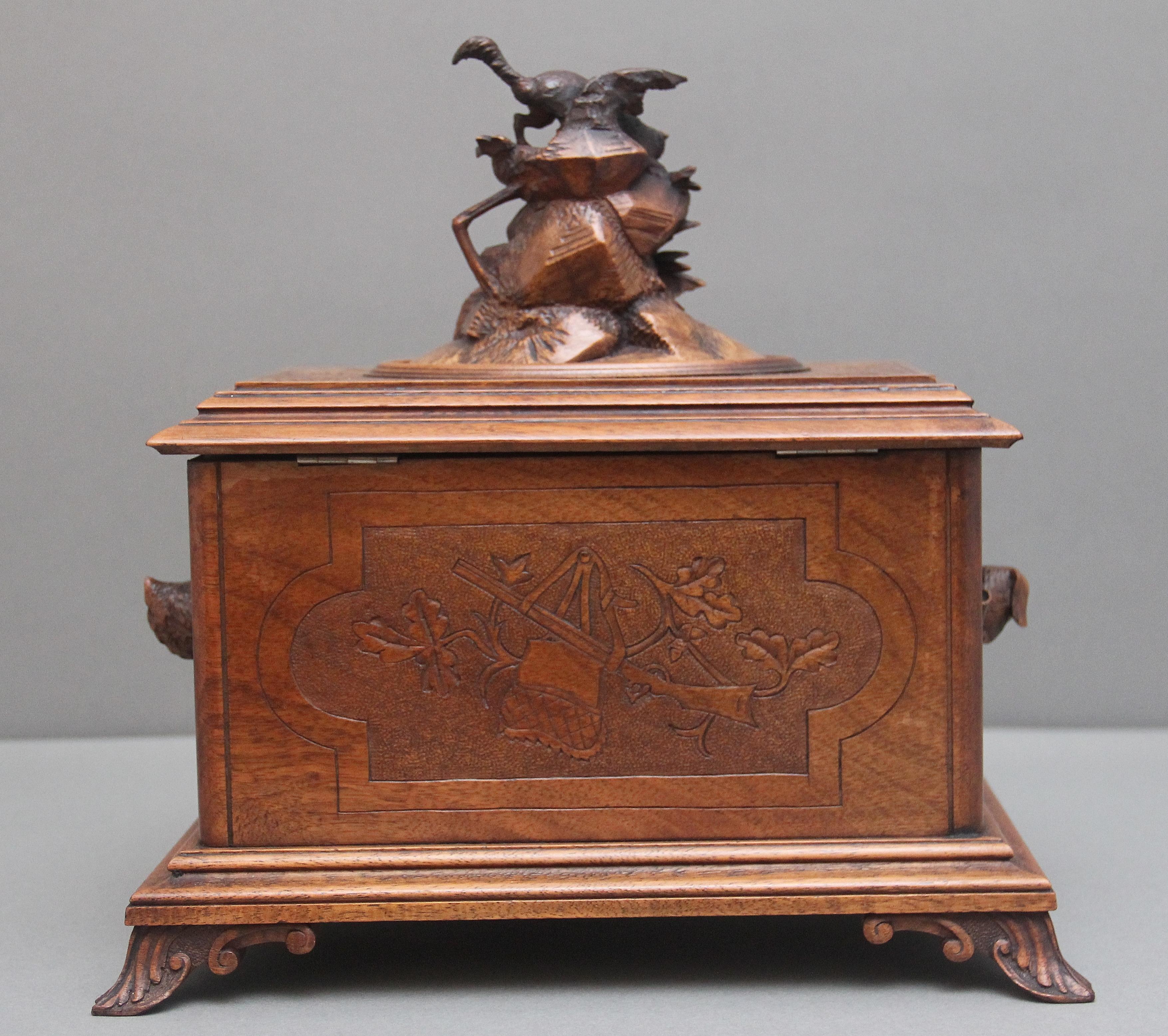 Late 19th Century 19th Century black forest carved wood casket For Sale