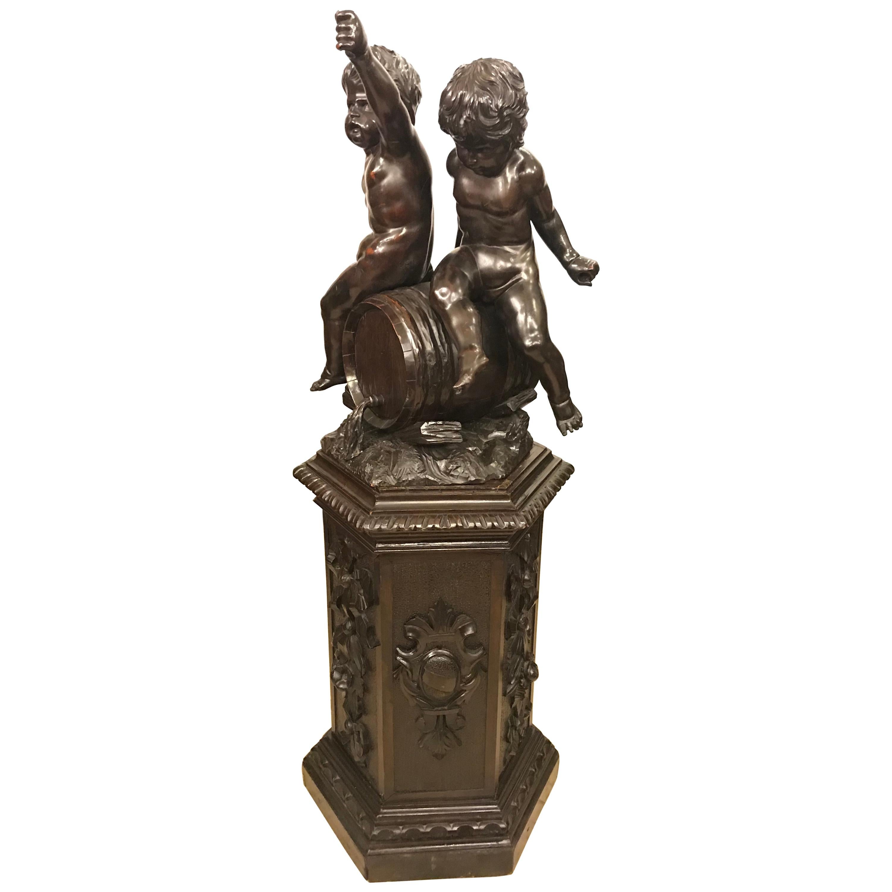 19th Century Black Forest Carving on Pedestal of Two Drunken Cherubs