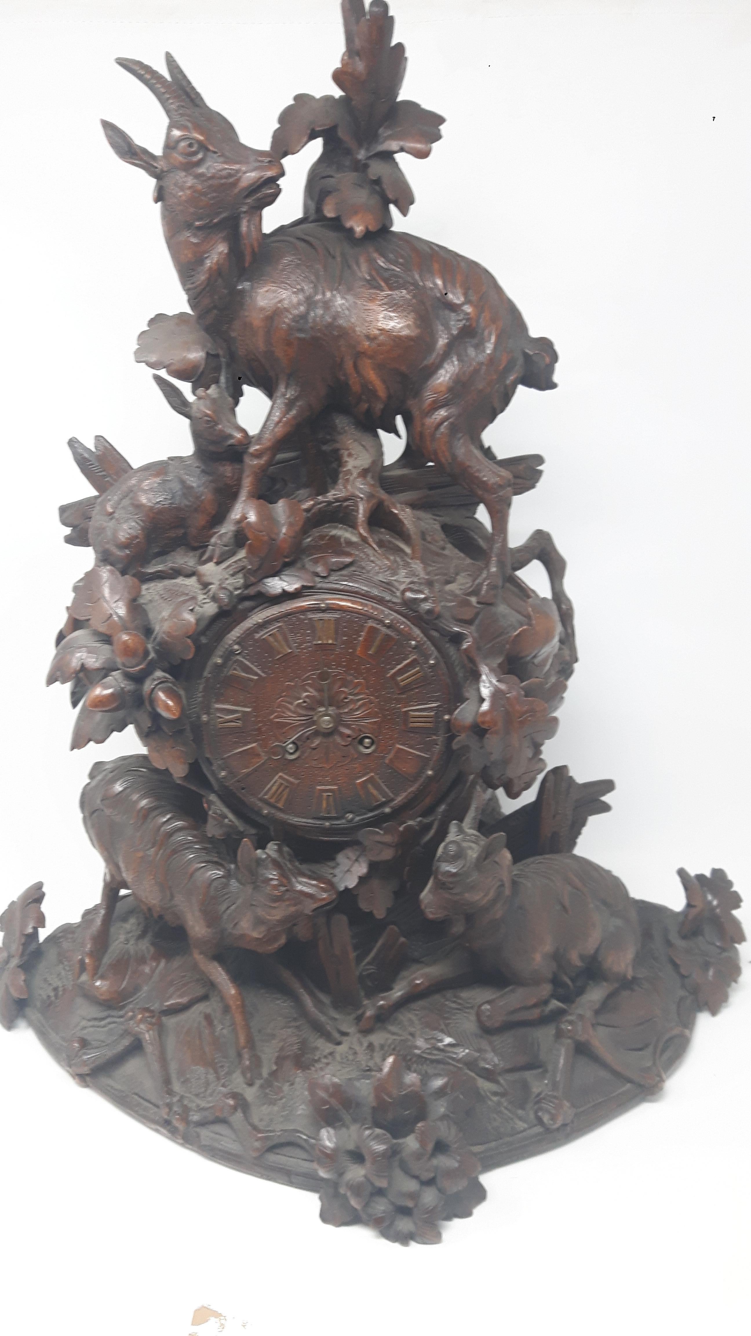Carved 19th Century Black Forest Clock For Sale