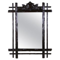 Miroir rustique du 19e siècle avec sculpture d'armoiries, Black Forest, vers 1880