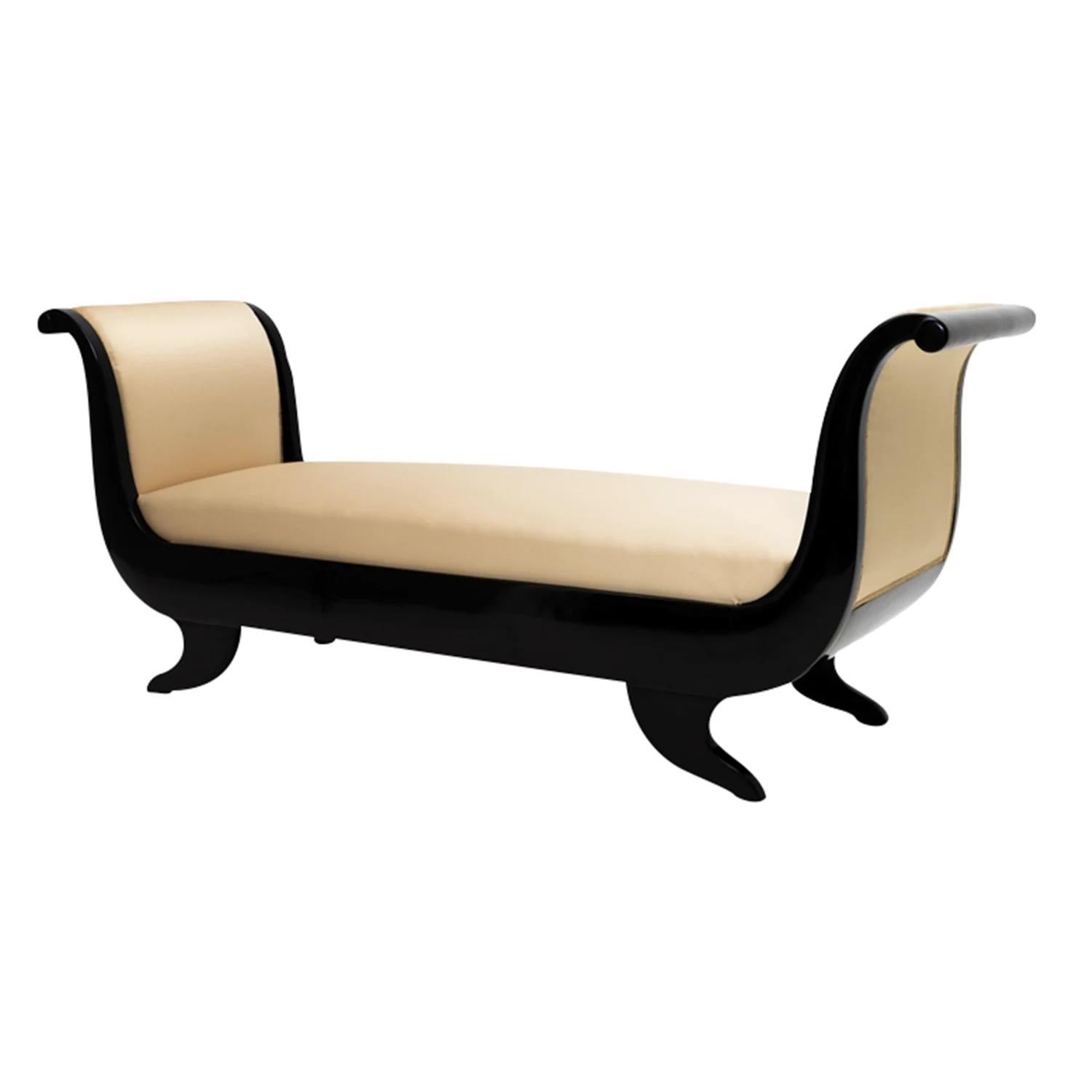 A black, antique French sofa bench-recamier made of hand crafted ebonized Mahogany, in good condition. The canapé is particularized by two side backrests, standing on four arched wooden feet. The settee represents the first French Empire time