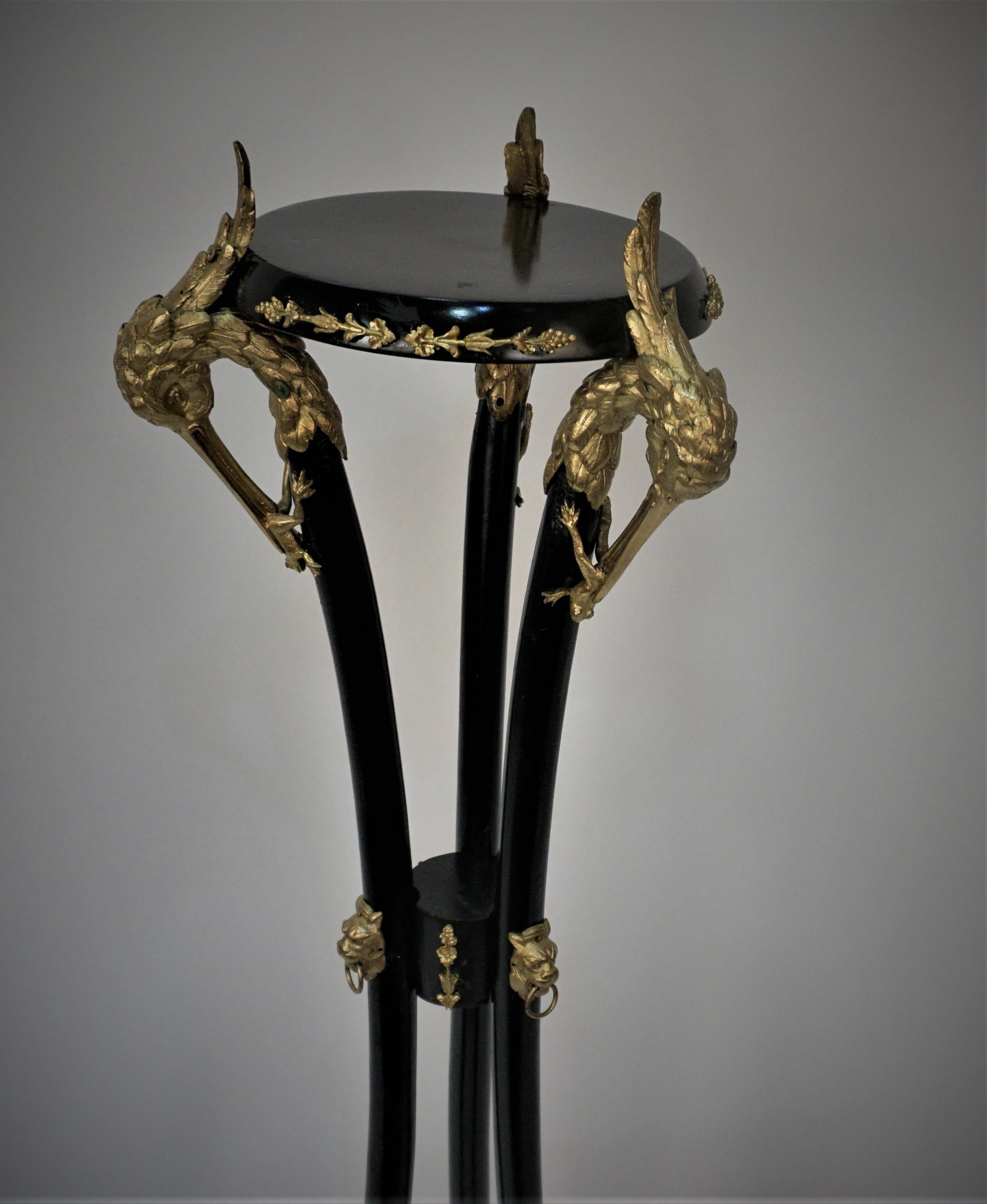 19th century black lacquered and bronze plant stand.
Measurement: 12