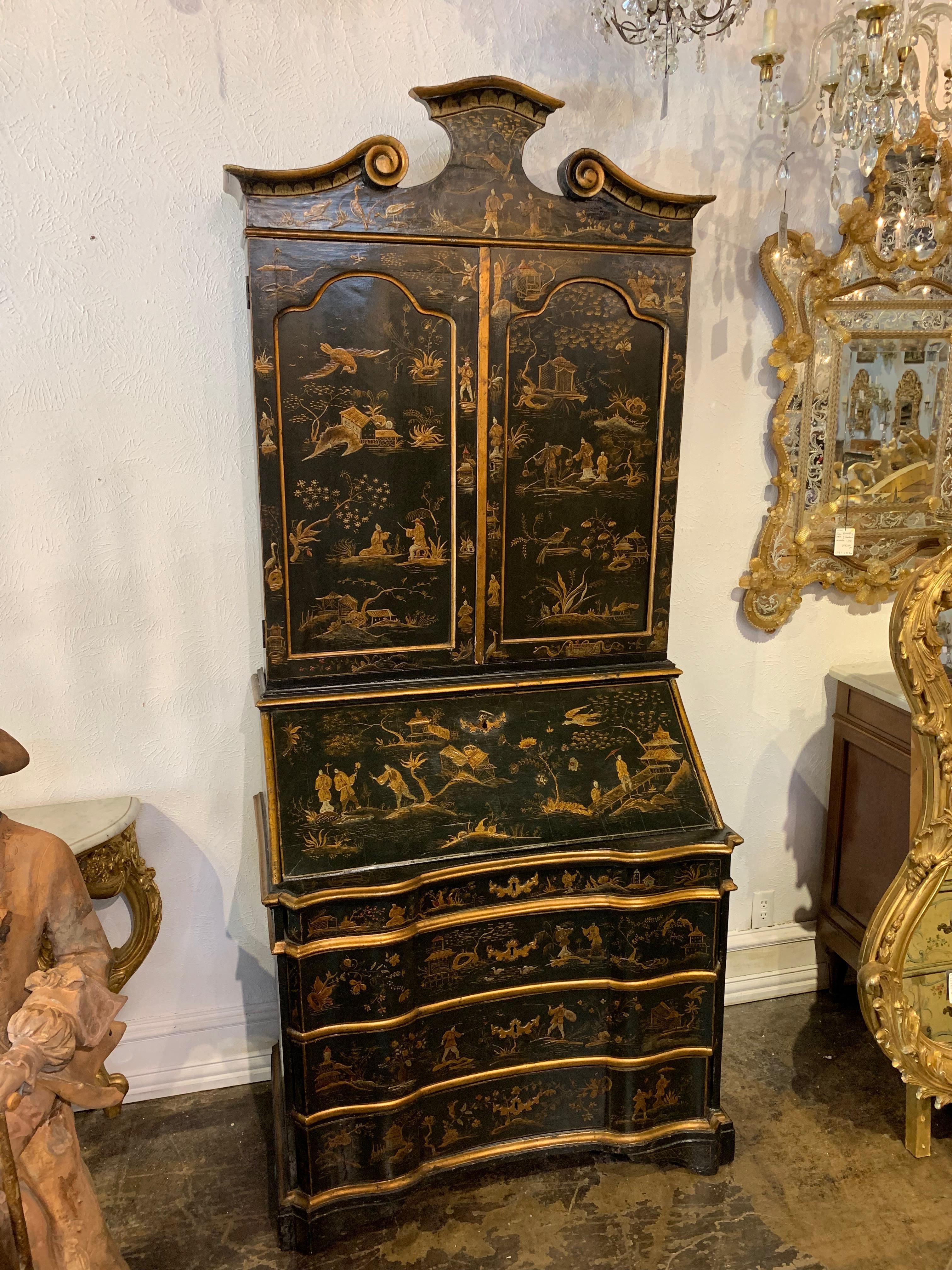 Lovely 19th century Italian black lacquered secretary. Beautifully done raised chinoiserie design. 
The inside also has a painted design and there is an abundance of storage as well. This is such a gorgeous piece that would become a family heirloom