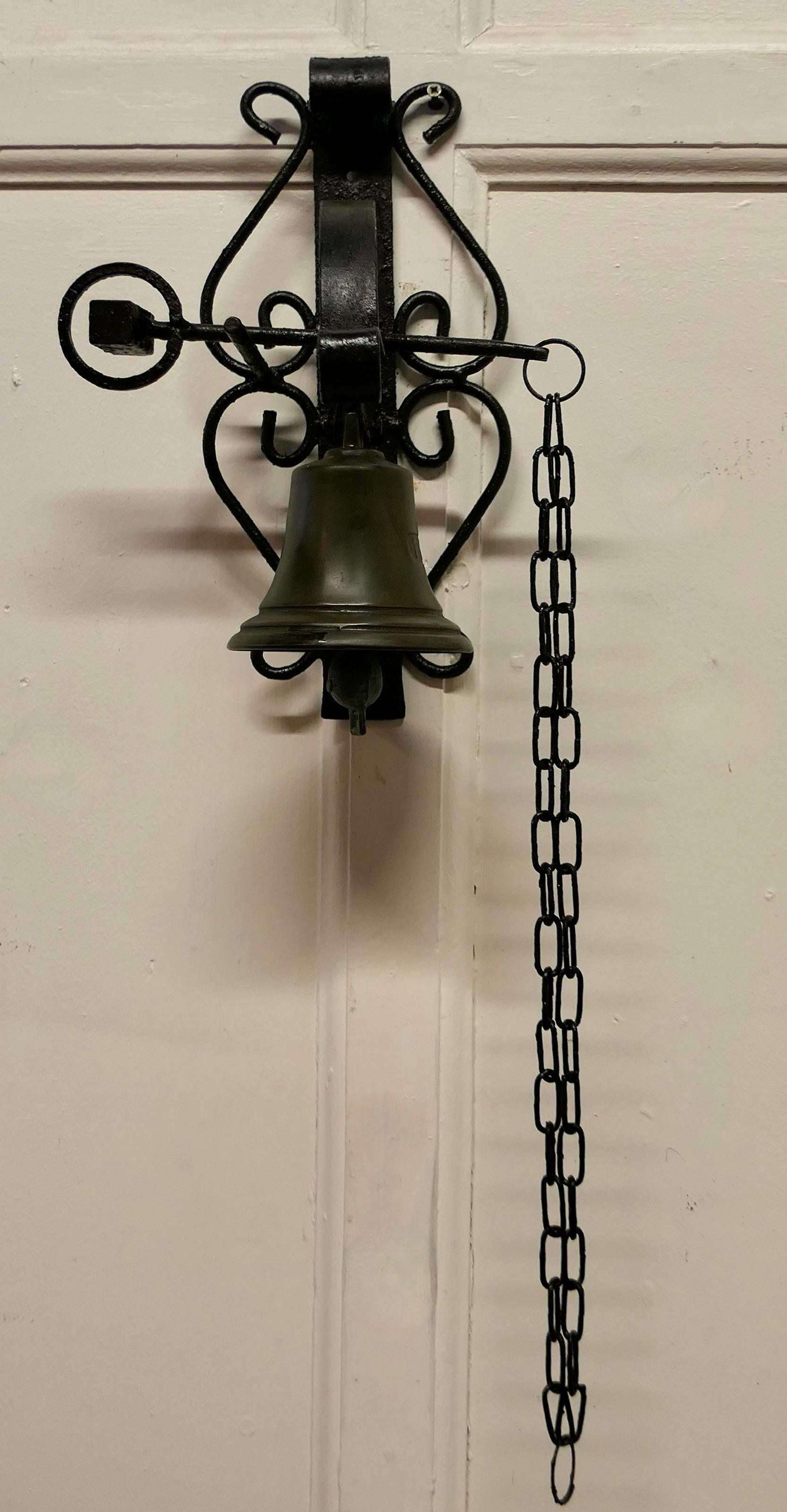 19th Century black wrought iron alpine front door bell.


This is a delightful and very unusual item, the brass bell is housed in an attractive wrought Iron frame, it is suspended on a rocking bracket and rung by pulling the chain and it has
