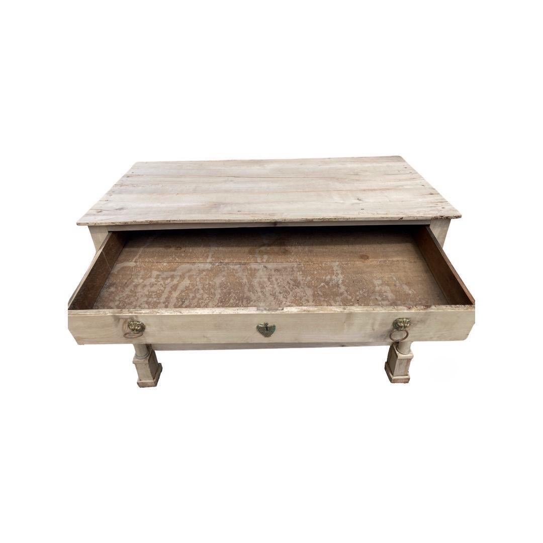 Bleached Italian Empire commode handmade using walnut and pegged construction. This is a beautifully-made piece with elegant proportions and details. The top is composed of three boards with flat ends, nailed to the case and, overall, the piece has