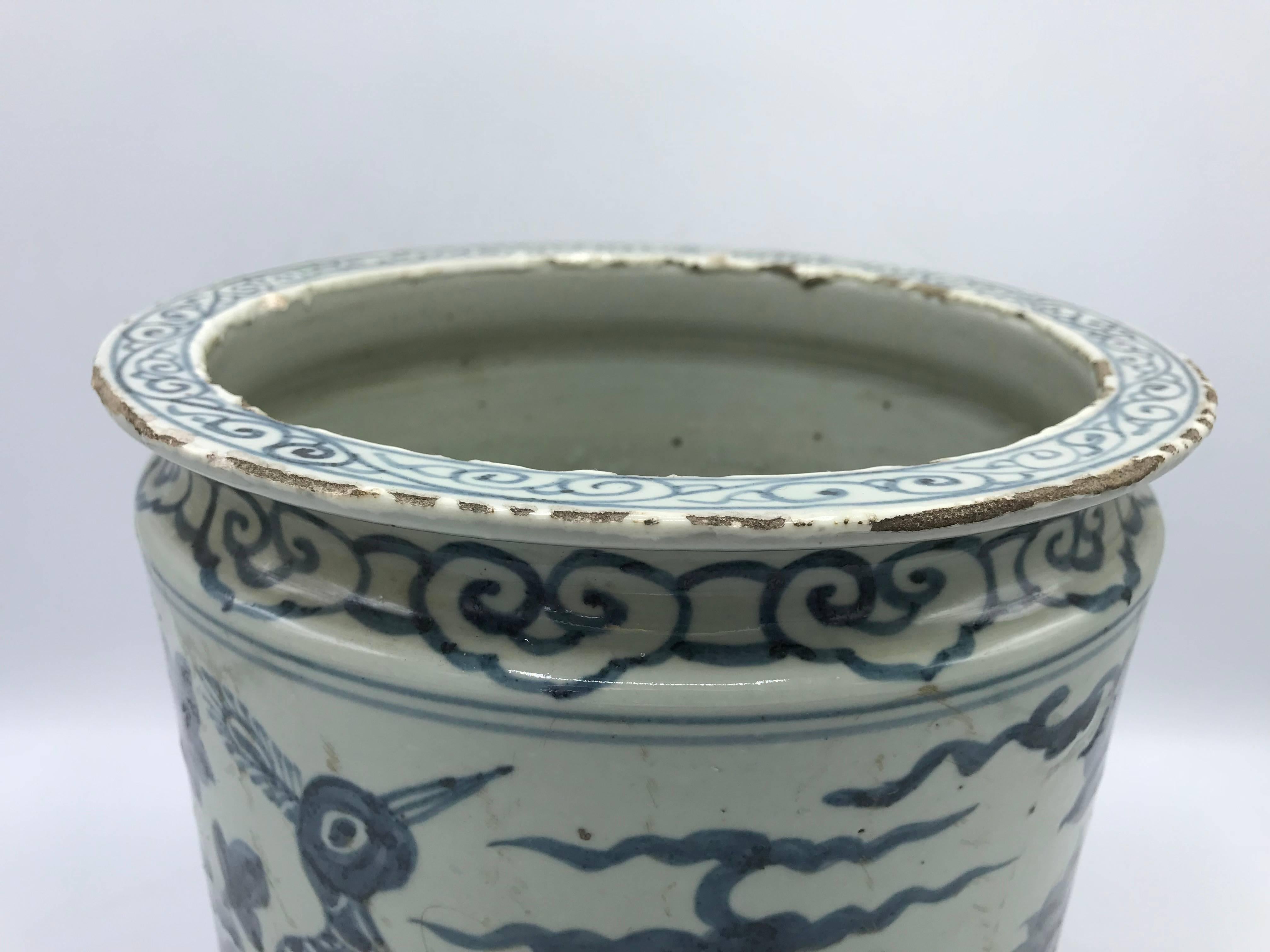 Asian 19th Century Blue and White Cachepot Planter with Peacock and Floral Motif