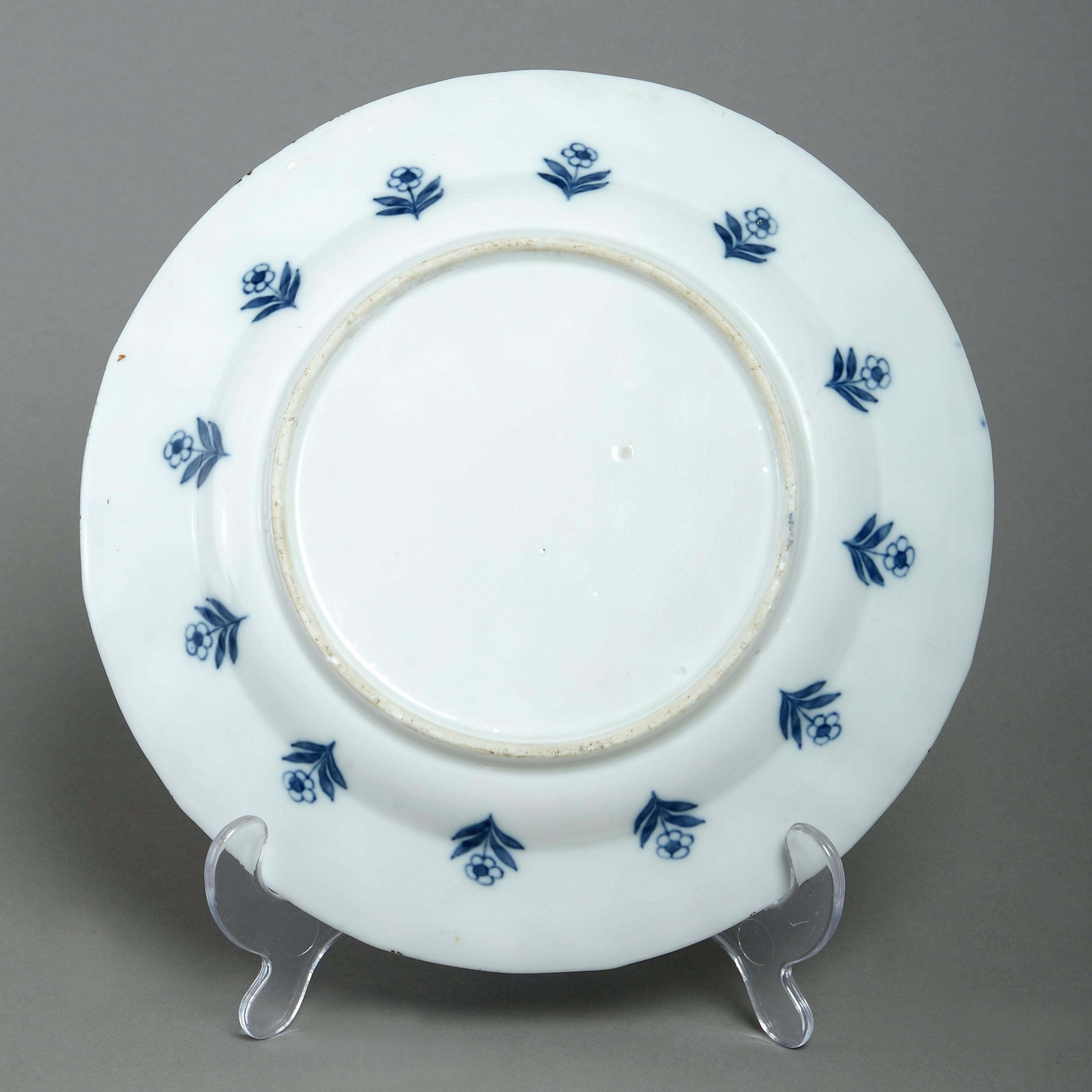 A blue and white glazed porcelain plate, decorated in the Kangxi manner. 

Qing dynasty.