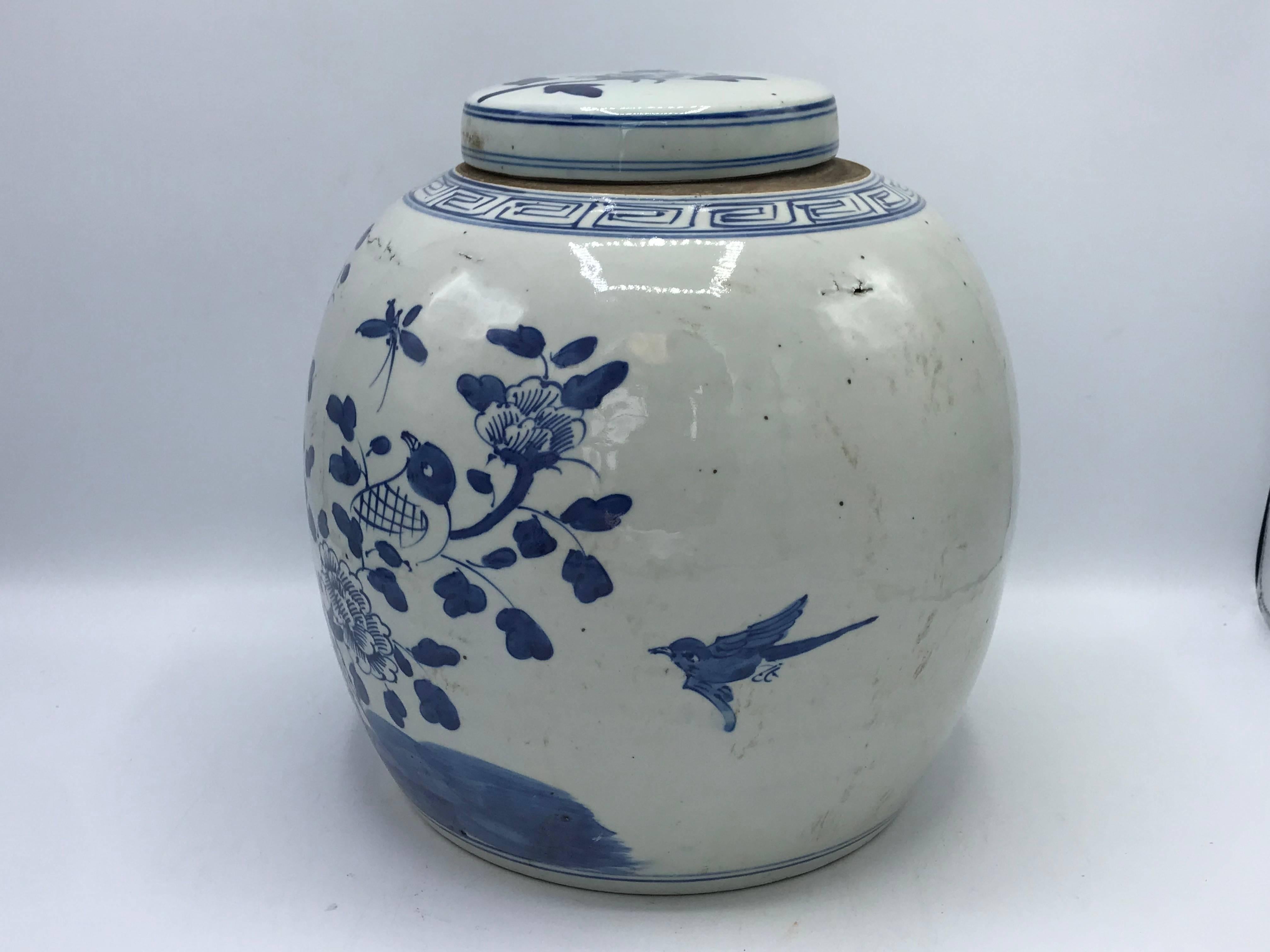Listed is a fabulous, 19th century blue and white ginger jar. The jar has a beautiful, bird and floral motif all-over. Heavy. Can hold water for floral arrangements.