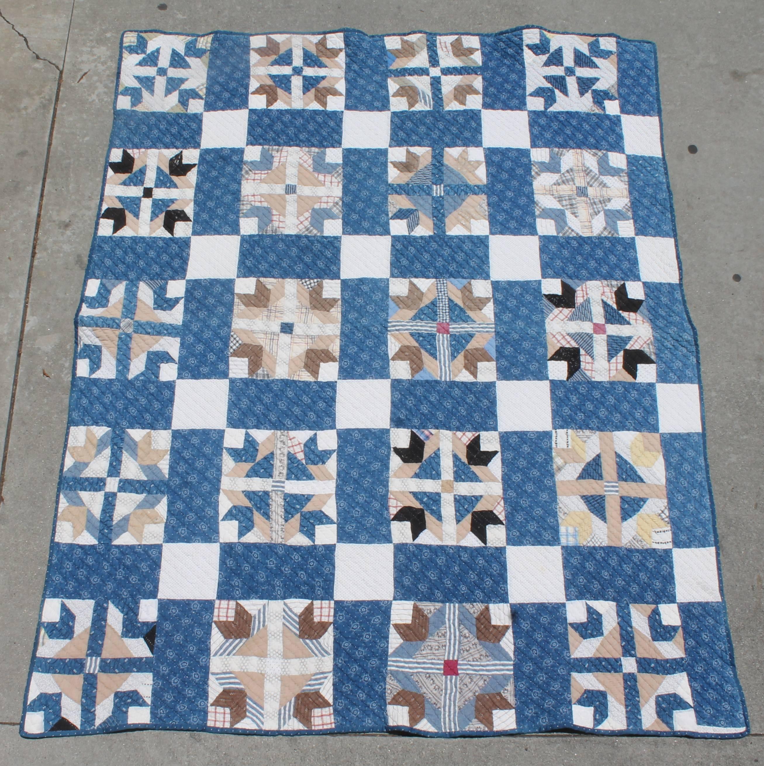 This country quilt has faded and muted calico fabric throughout. Mix of different calico fabrics. Minor wear on reverse in spots.
