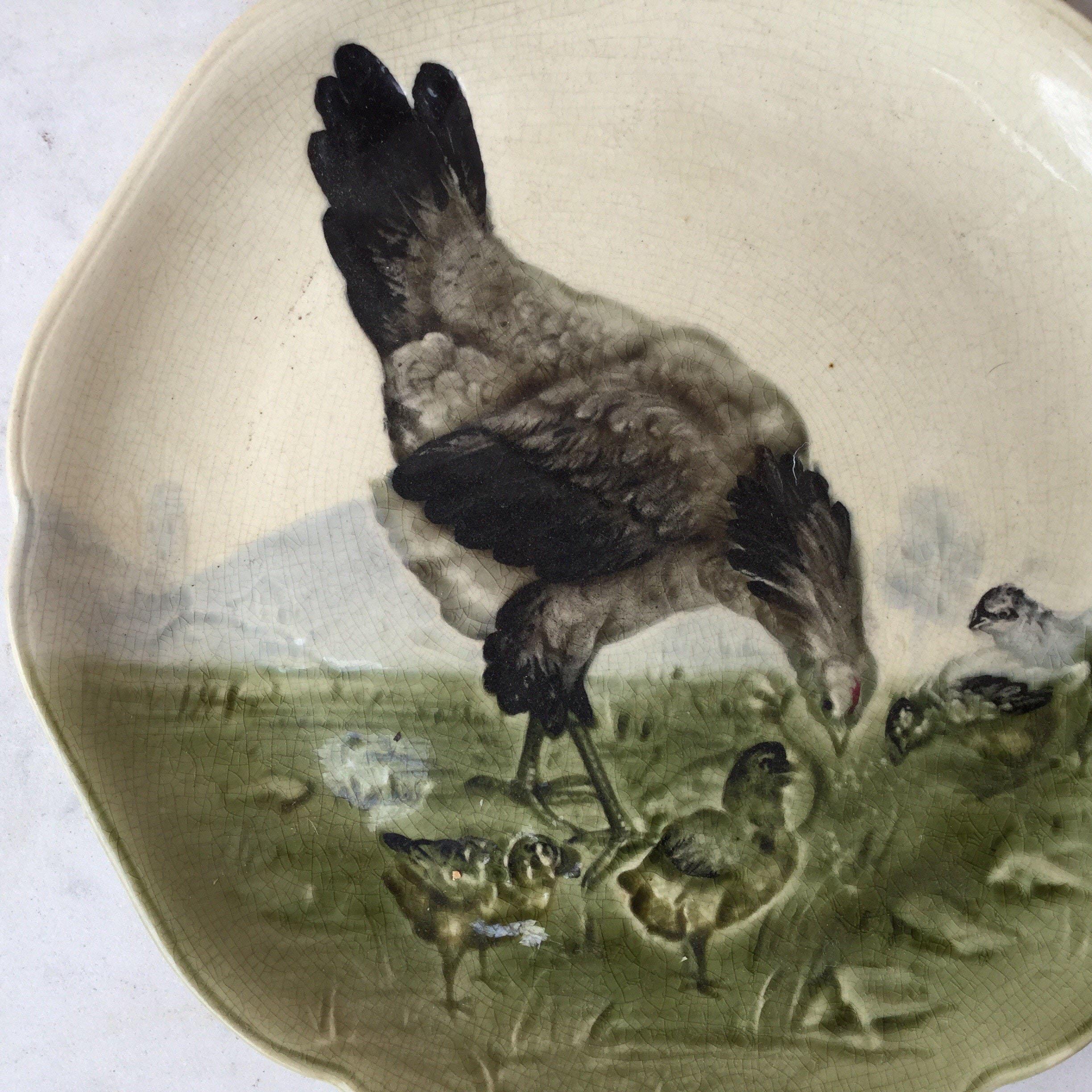 Majolica plate with hen and chicks signed Hippolyte Boulenger Choisy le Roi, circa 1890.
The manufacture of Choisy le Roi was one of the most important manufacture at the end of 19th century, they produced very high quality ceramics of all kinds as