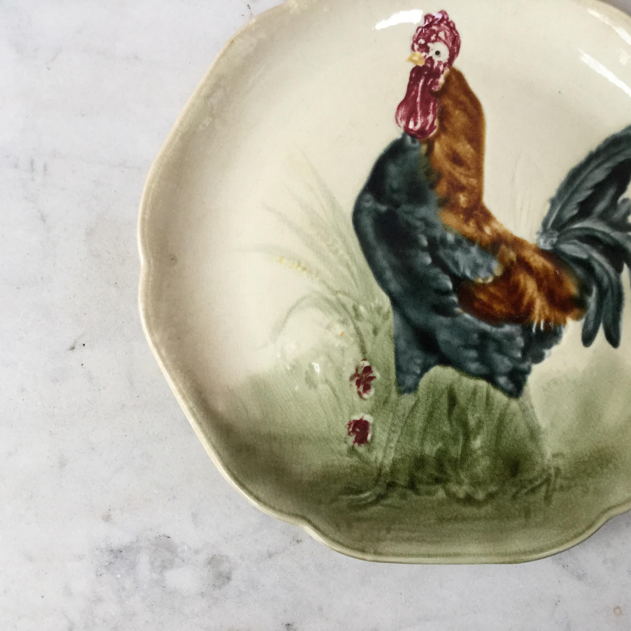 Majolica plate with rooster signed Hippolyte Boulenger Choisy le Roi, circa 1890.
The manufacture of Choisy le Roi was one of the most important manufacture at the end of 19th century, they produced very high quality ceramics of all kinds as