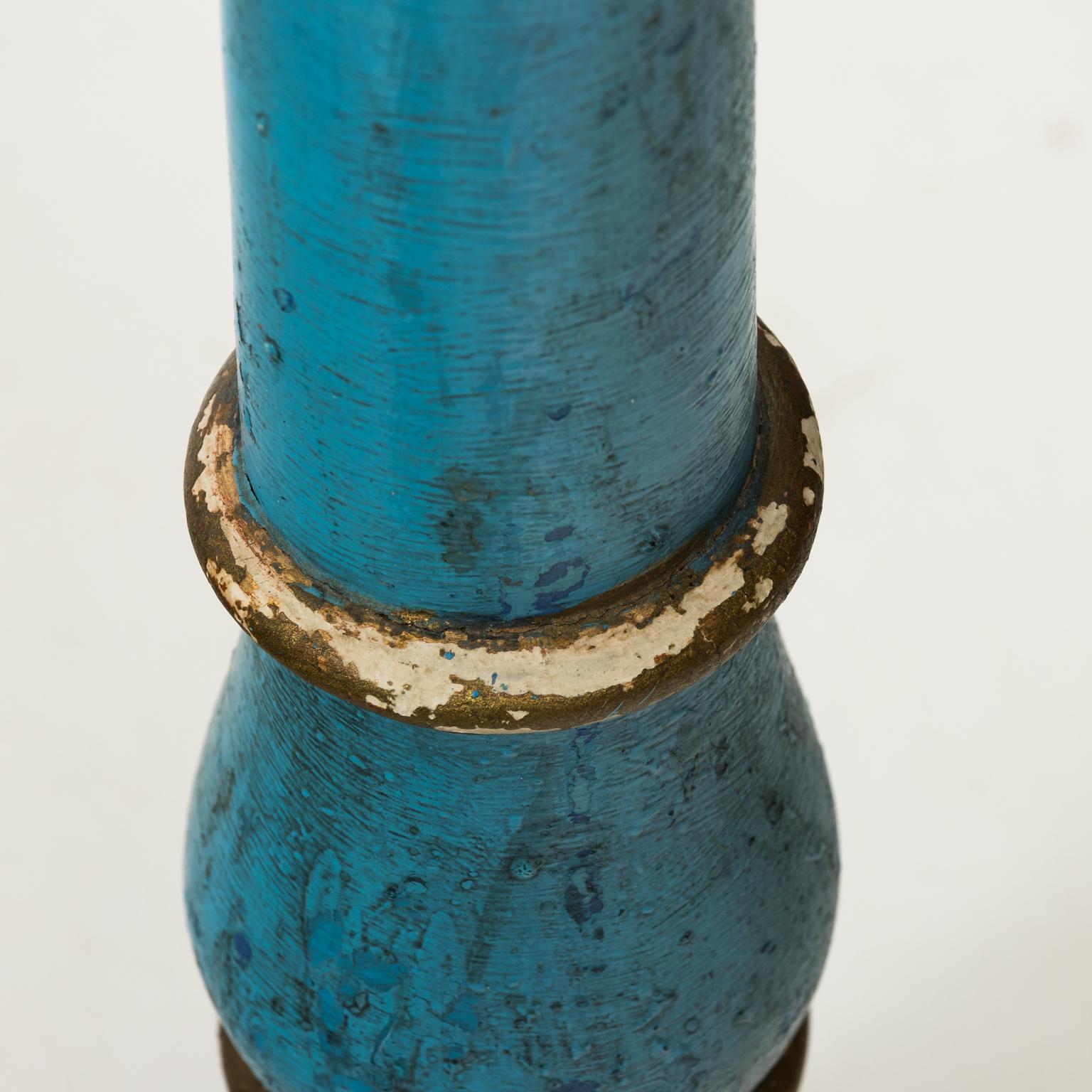 19th century Gustavian blue painted wooden candlesticks with gilded details.
 