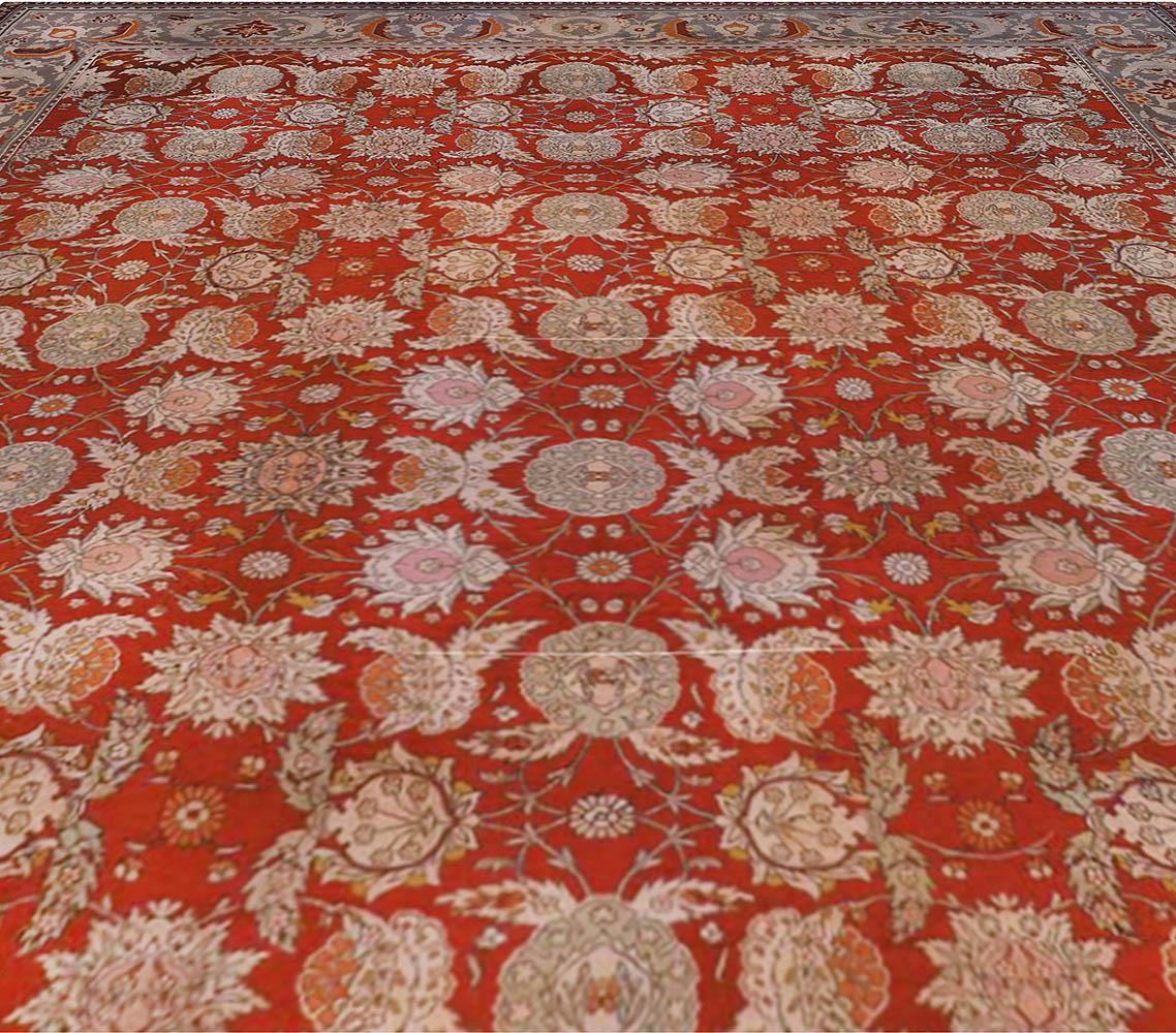 19th century bold Turkish Hereke red handwoven wool carpet
Size: 12'8