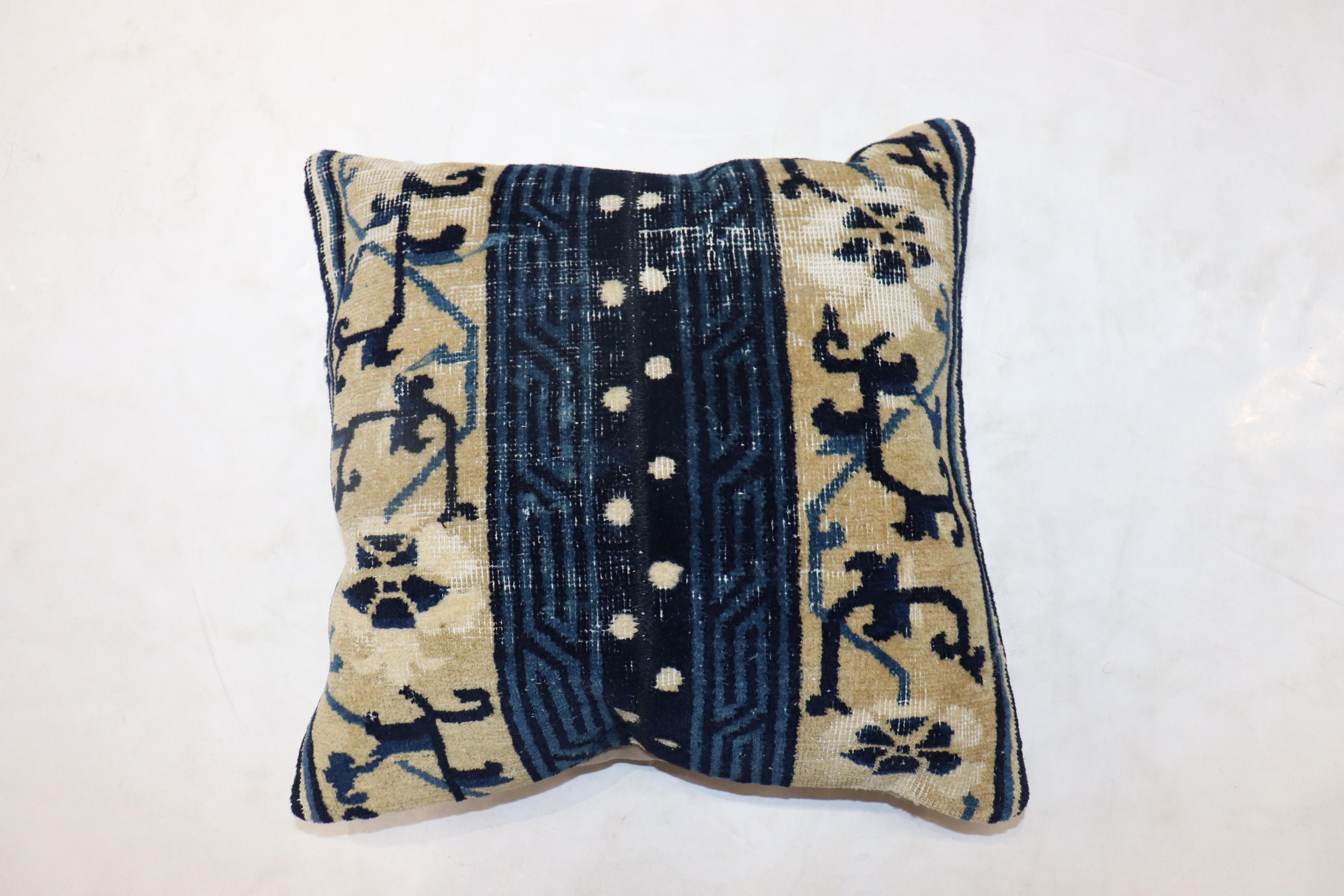 A pillow made from a 19th-century Chinese rug. Zipper closure and insert included.

Measures: 17” x 18''.