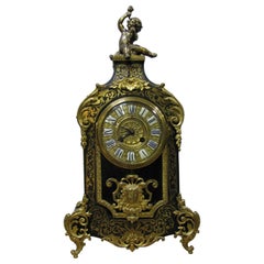19th Century Boulle Mantel Clock Richly Ornamented