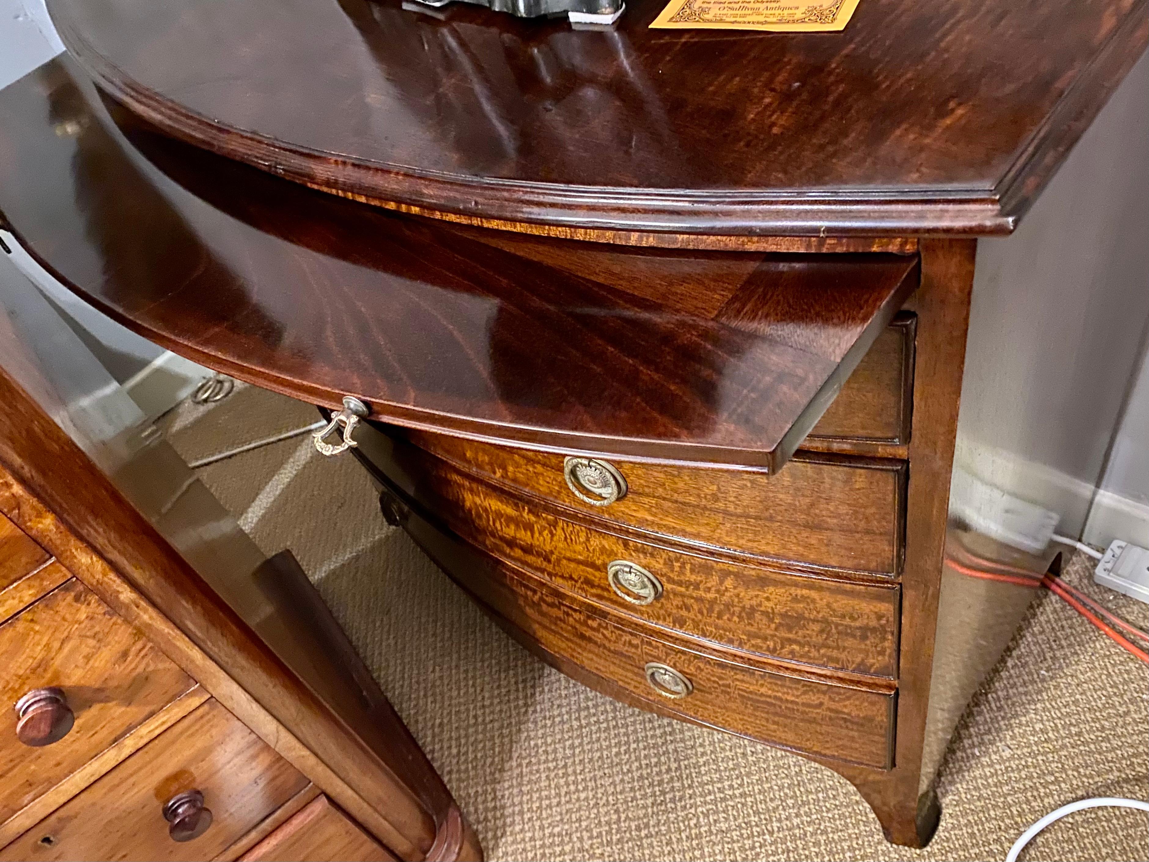 Brass 19th Century Bow Fronted Mahogany Chest with Pull-Out Dressing Slide For Sale
