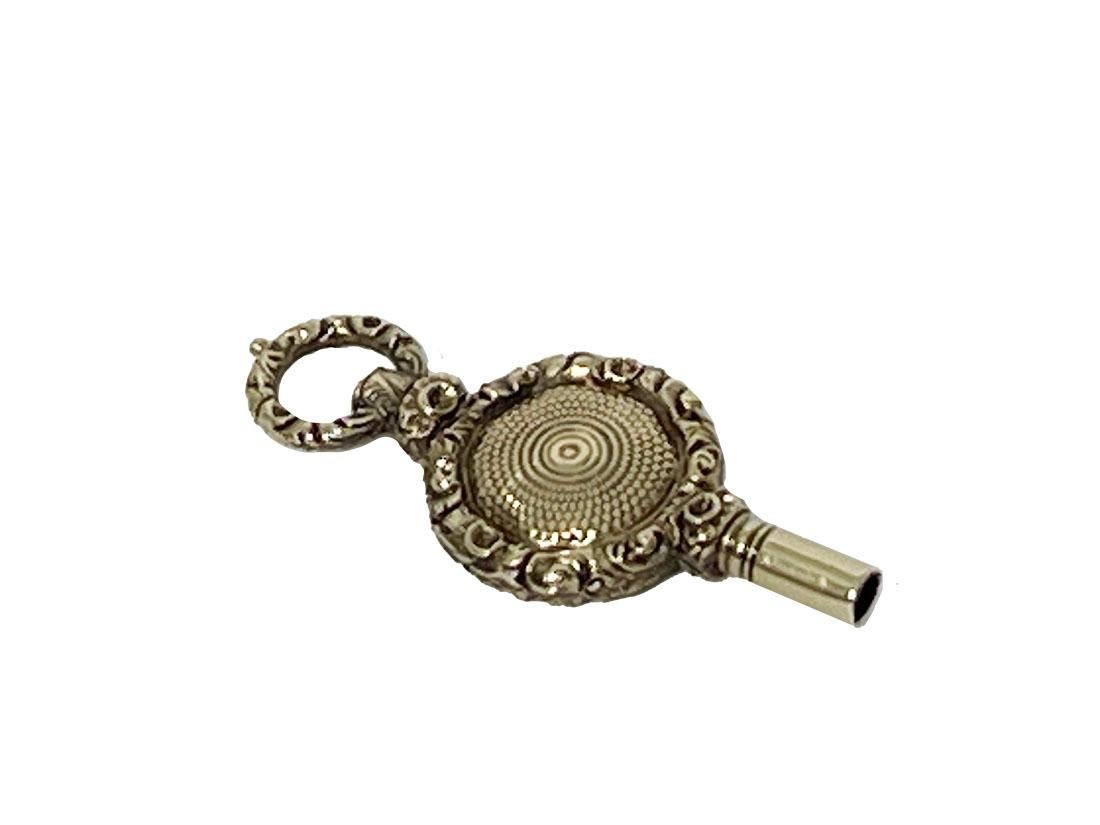 Chiave per orologio in ottone e oro del XIX secolo In condizioni buone in vendita a Delft, NL