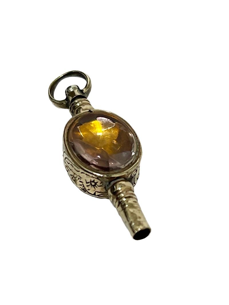 Dutch 19th Century Brass and Gold Watch-Key with 2 Different Colored Stones For Sale