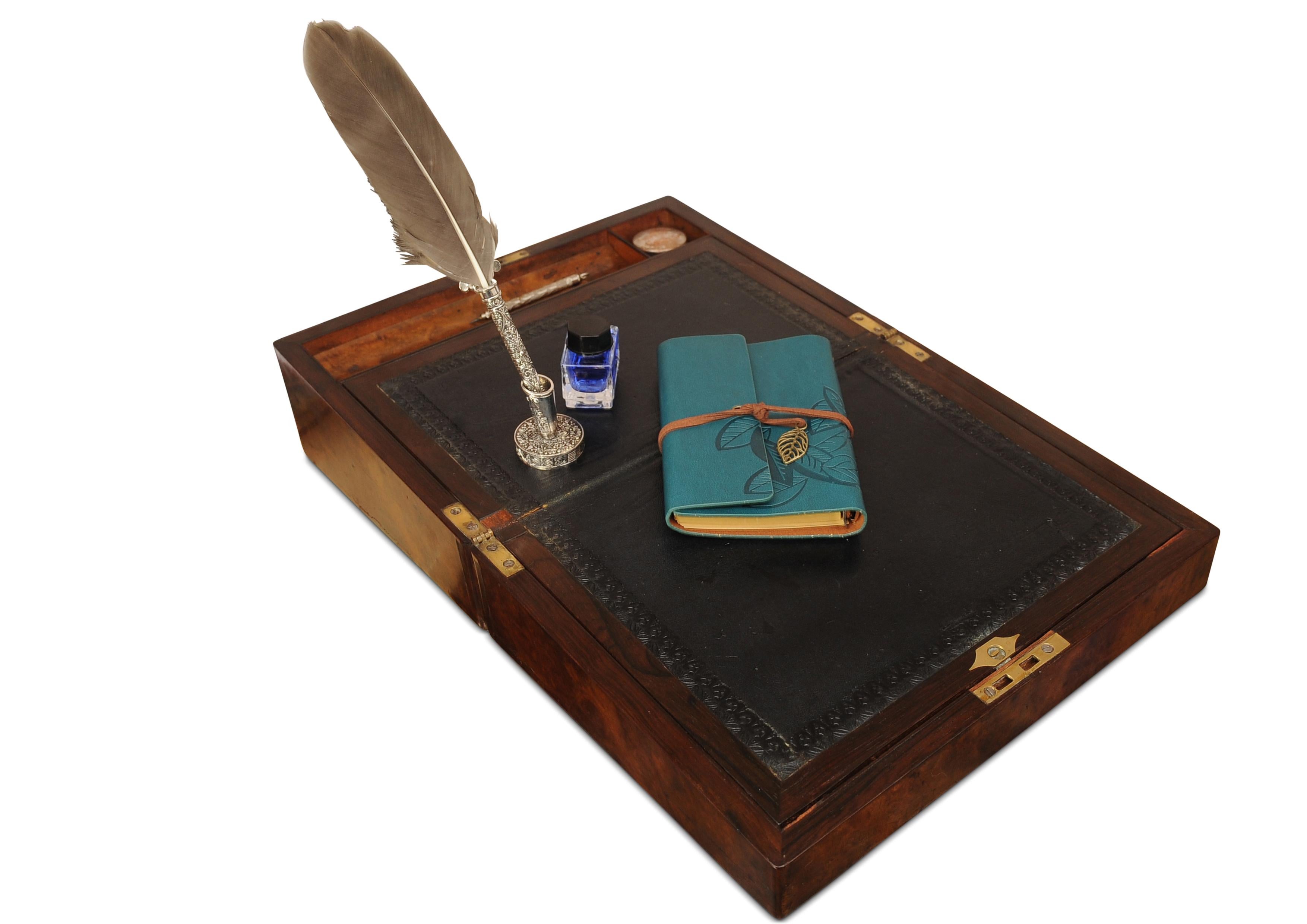 19th Century Burr Walnut Handcrafted Exquisite Writing Slope With Brass Inlay

A handcrafted exquisite writing slope with tooled leather fitted interior befit with a glass inkwell

Would make an ideal gift for the writing enthusiast.
Item will