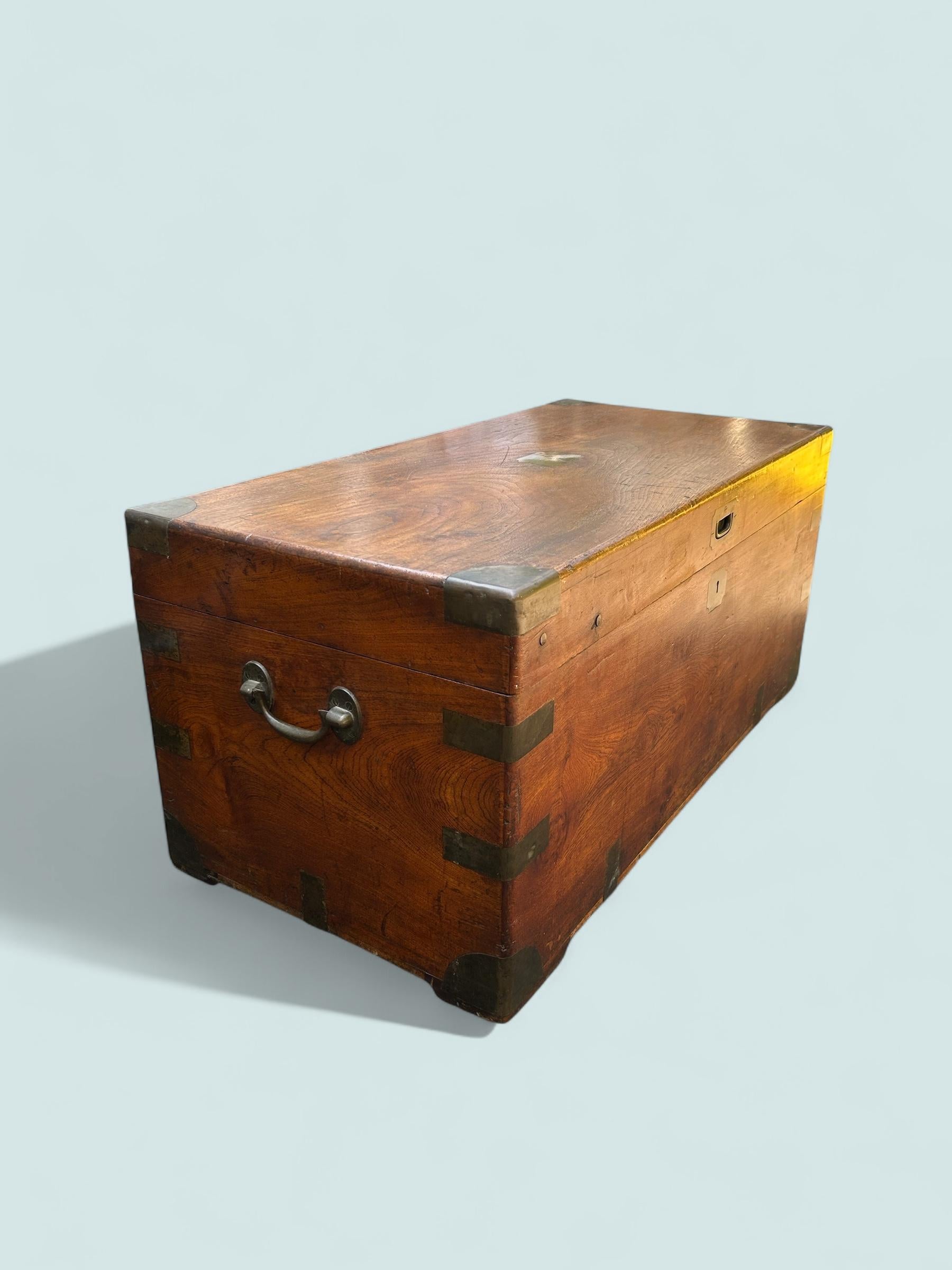 19th century camphor chest circa 1880 in wonderful untouched condition retaining all of its brass strap work, carrying handles and lock with original working key, the chest also retains its original maker’s paper label.