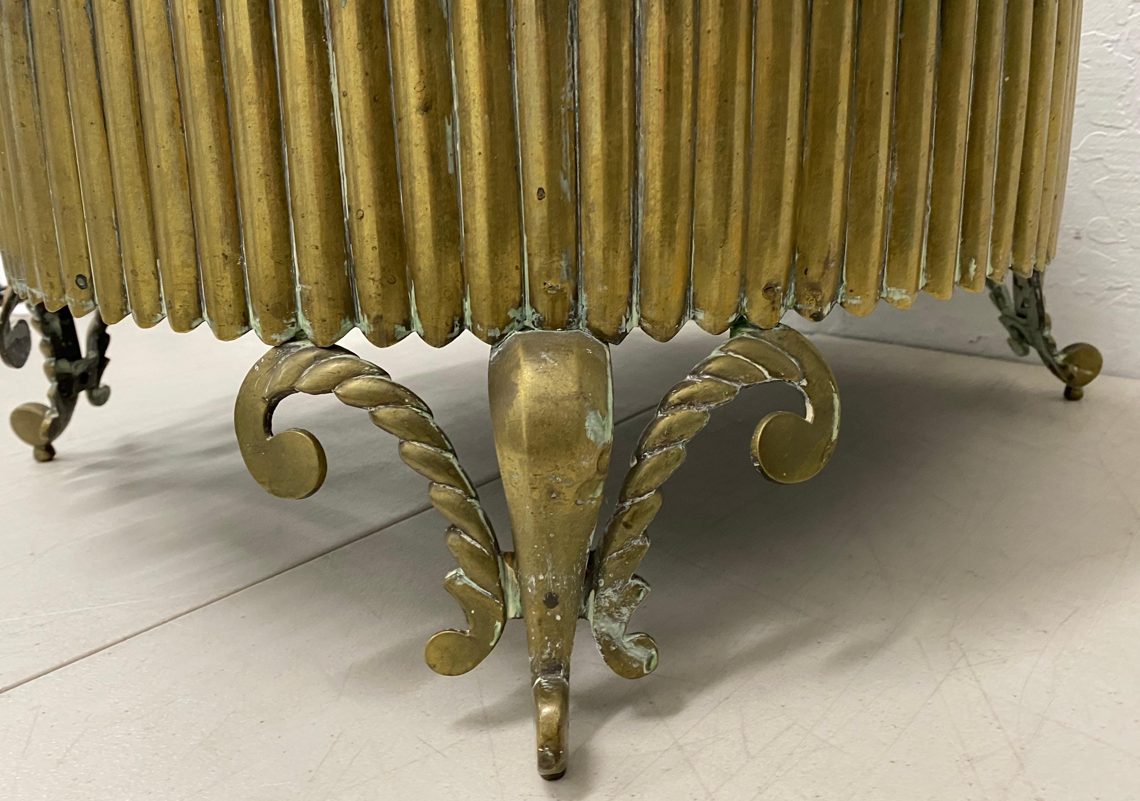 19th century brass brazier with skewers

Measures: 22