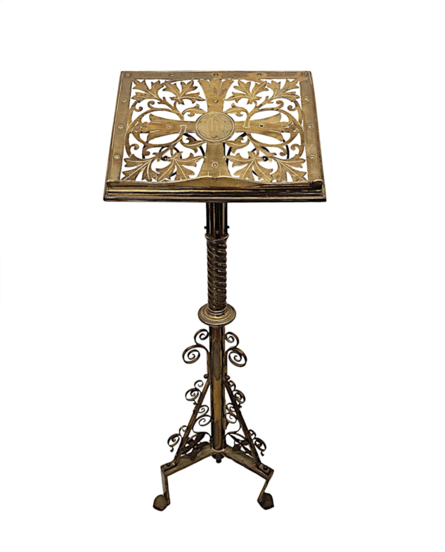 A very rare 19th Century finely cast brass church lectern.  The pierced lectern of rectangular form features a centred cross motif set within a stunning arrangement of richly scrolling foliate.  Raised over an elegant brass pole support with