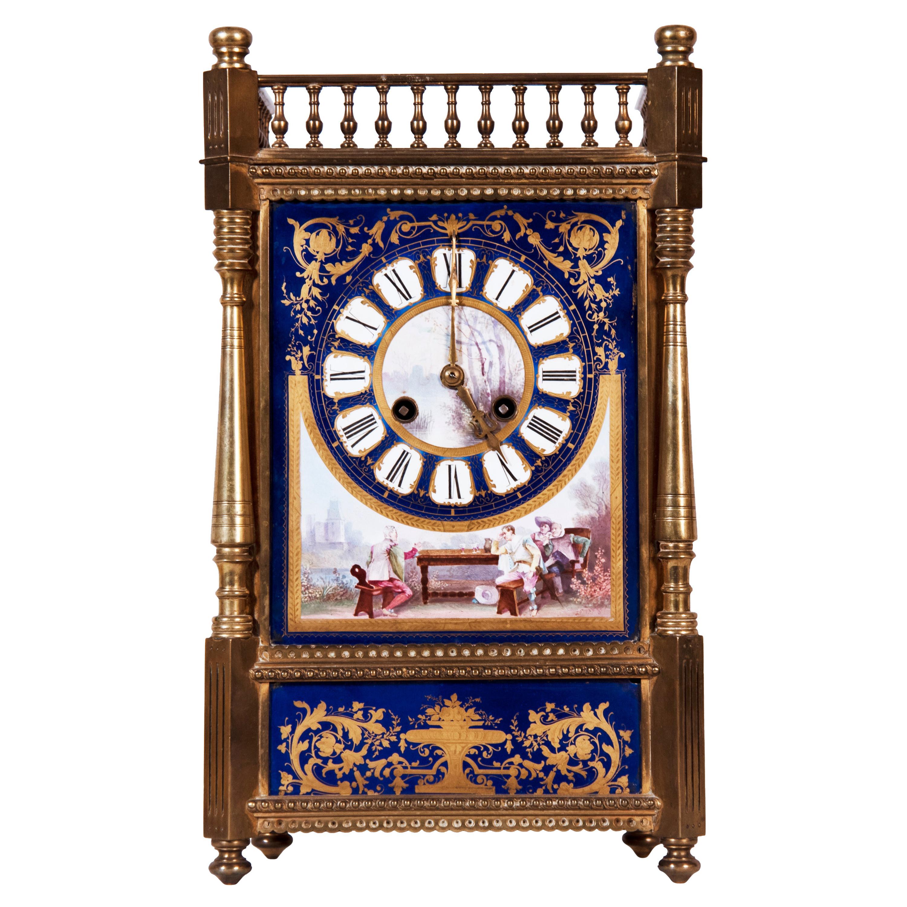 An English Porcelain Clock and Ormolu Garniture For Sale