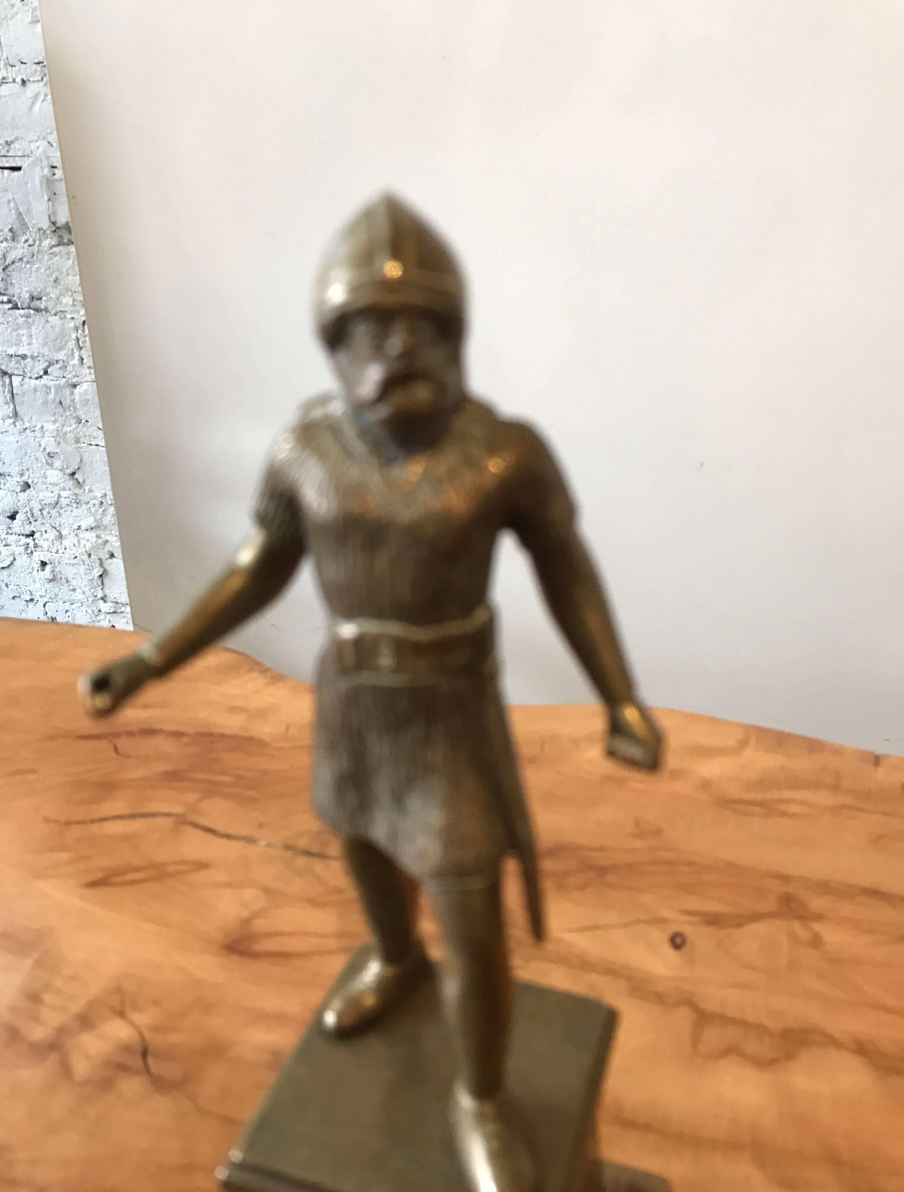 A 19th century brass figural sculpture of a fierce Viking warrior.
Enchanting decorative tabletop object. Fine desk top accessory.
Highest quality casting. Fine historic memorabilia.