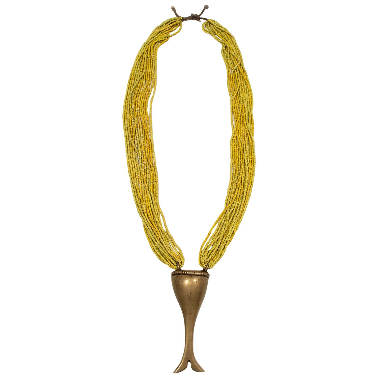 19th Century Brass Pendant on Yellow Multi-Strand Beaded Necklace, Naga, India