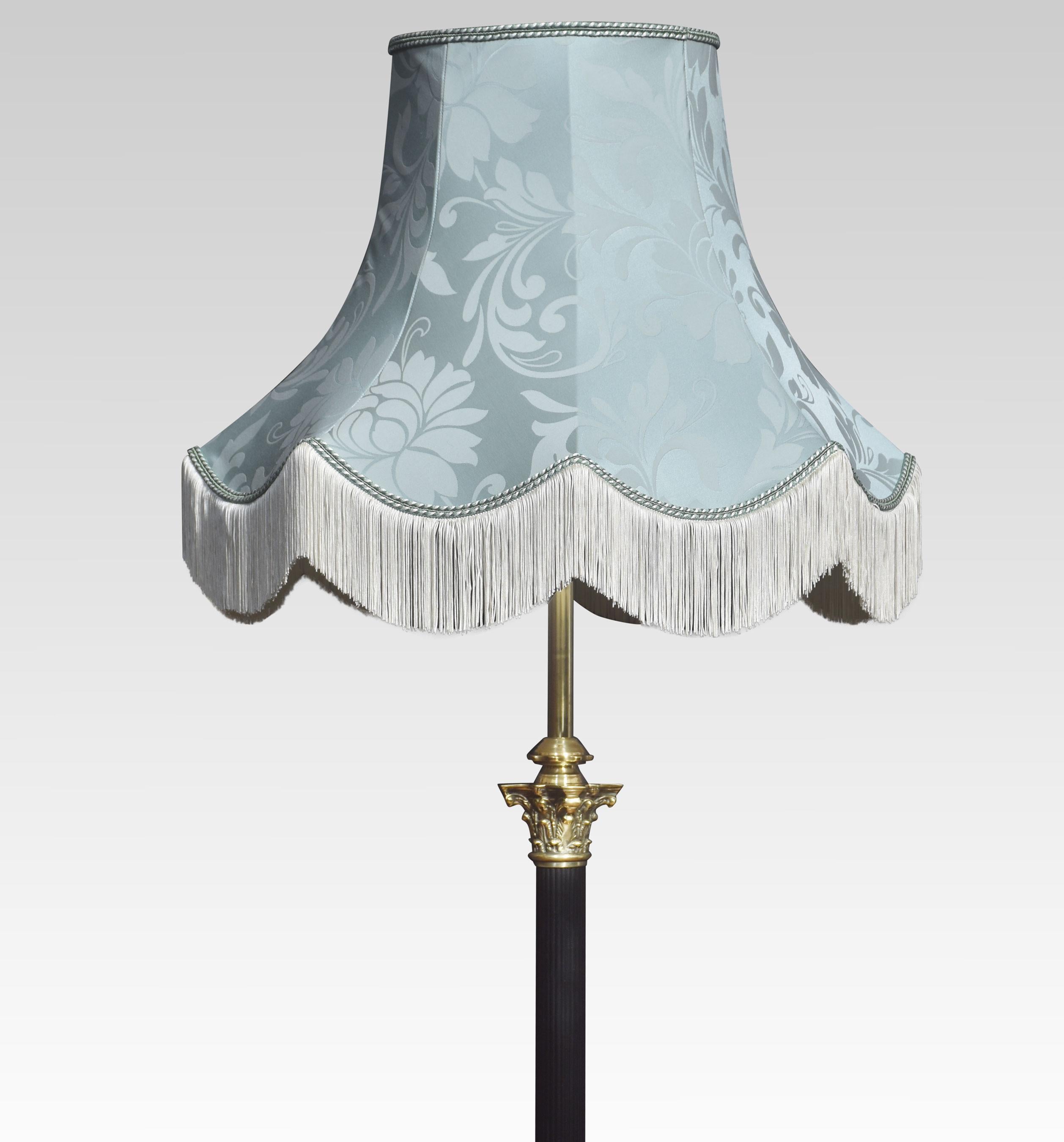 Brass standard lamp. Having a Corinthian column and adjustable stem, raised up on a stepped square base terminating in paw feet. Converted for electricity.
Dimensions
Height 53 Inches adjustable to 72 Inches
Width 16 Inches
Depth 16 Inches