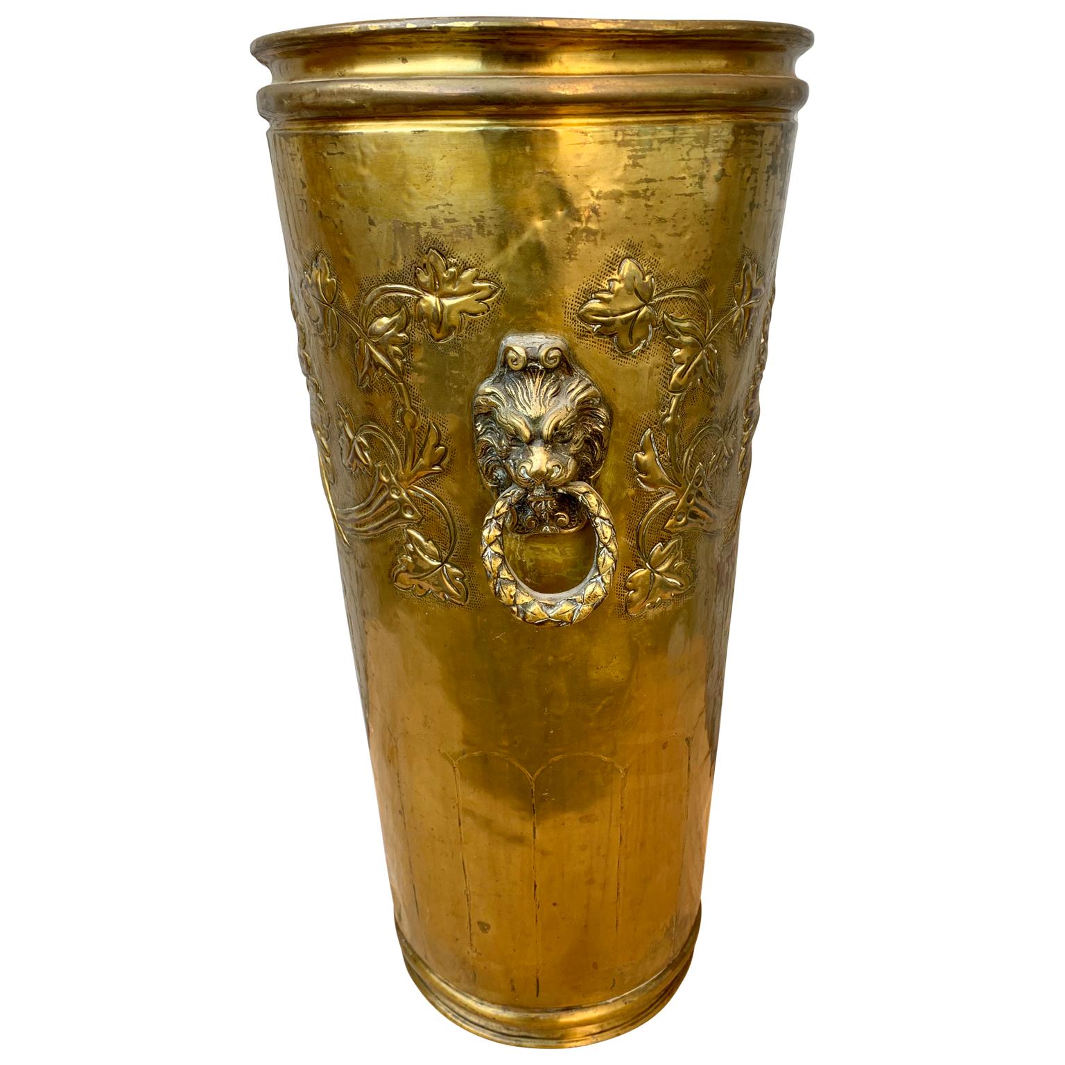 A late 19th century Belgian brass umbrella stand with mythological decorations. Marked E Houbil and with the name of the city of Dinant, Vallonie region of Belgium.