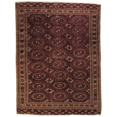 19th Century Brilliant Red Symmetrical Gul Turkmenistan Antique Rug, ca 1890