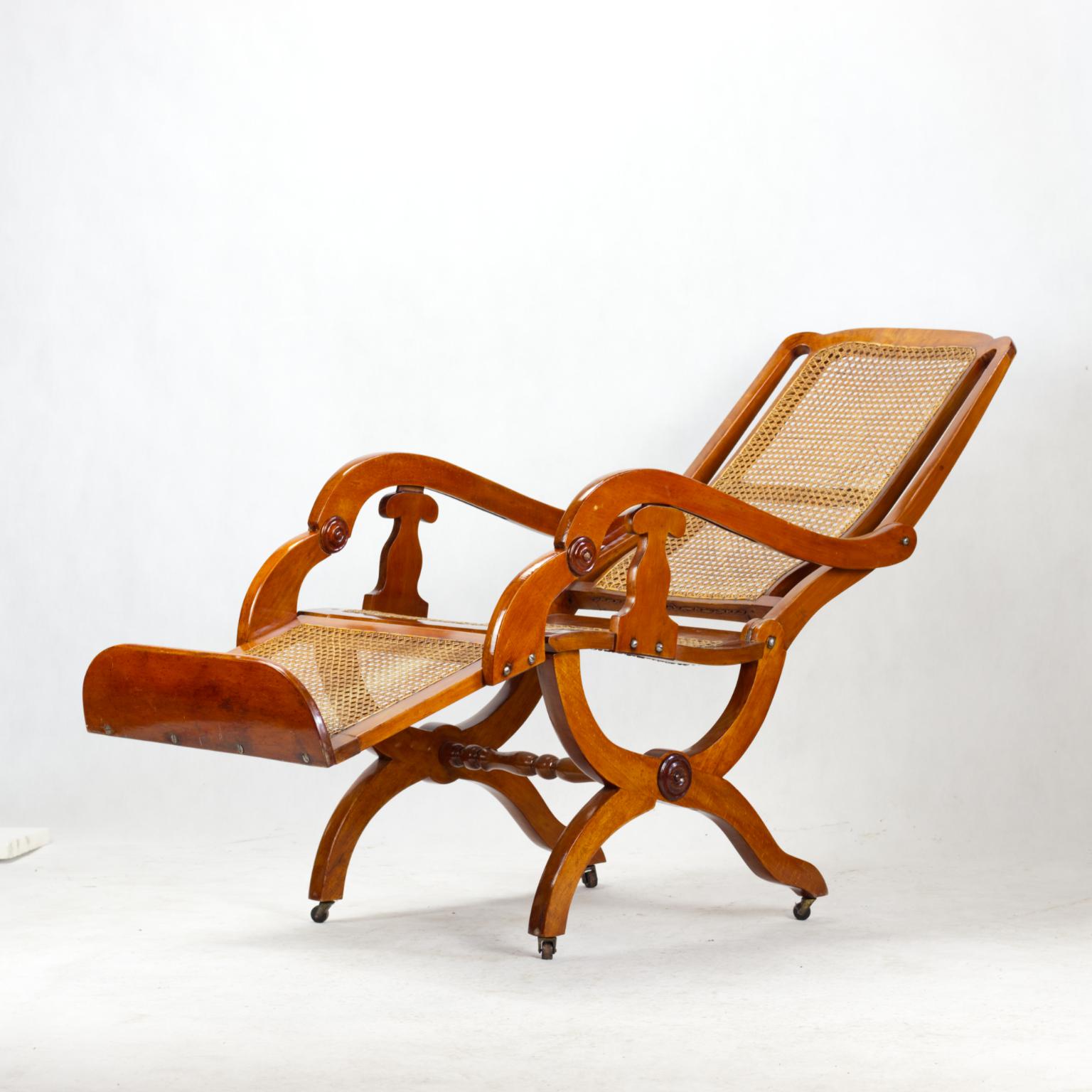 German 19th Century Biedermeier Reclining Cane Chair For Sale