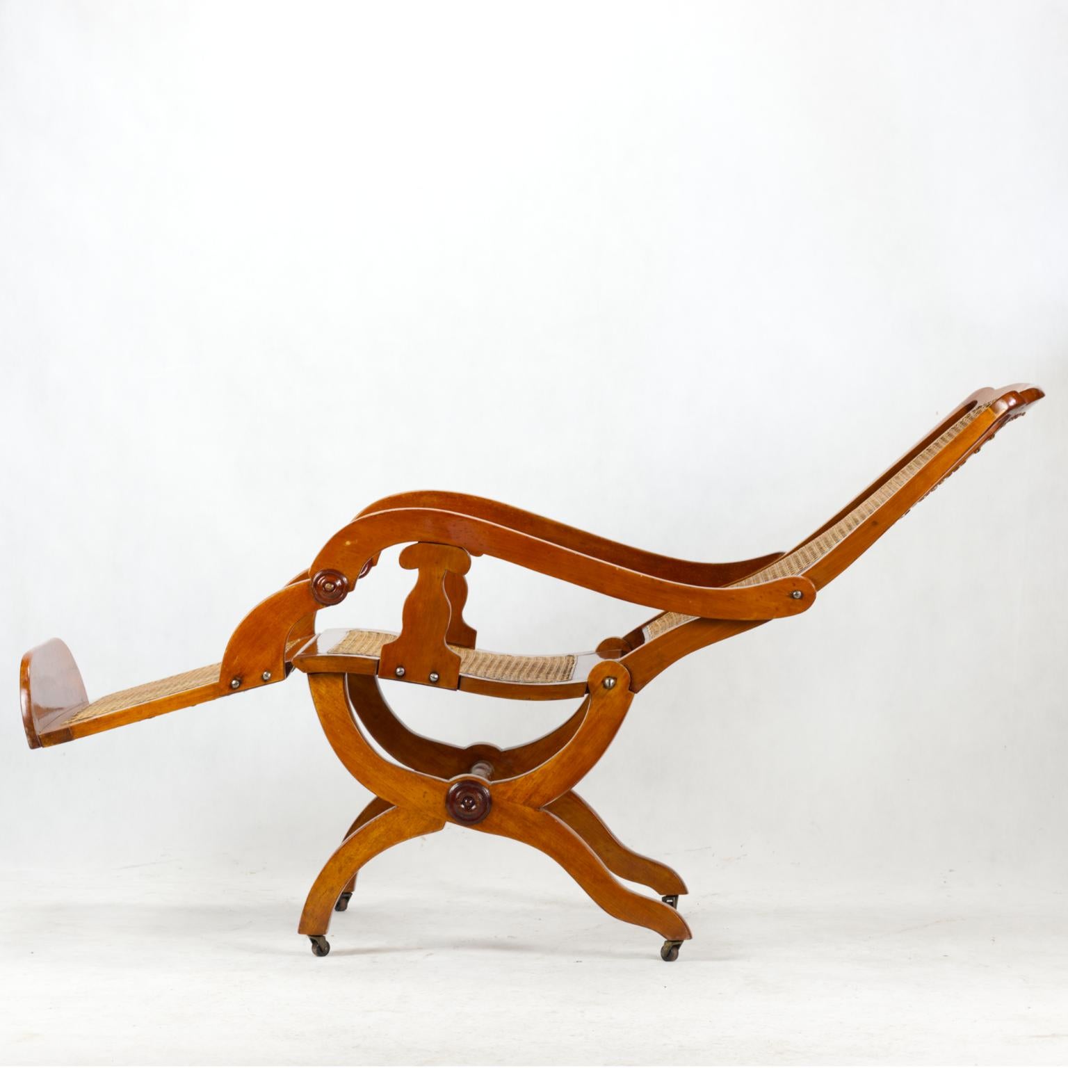 19th Century Biedermeier Reclining Cane Chair For Sale 1