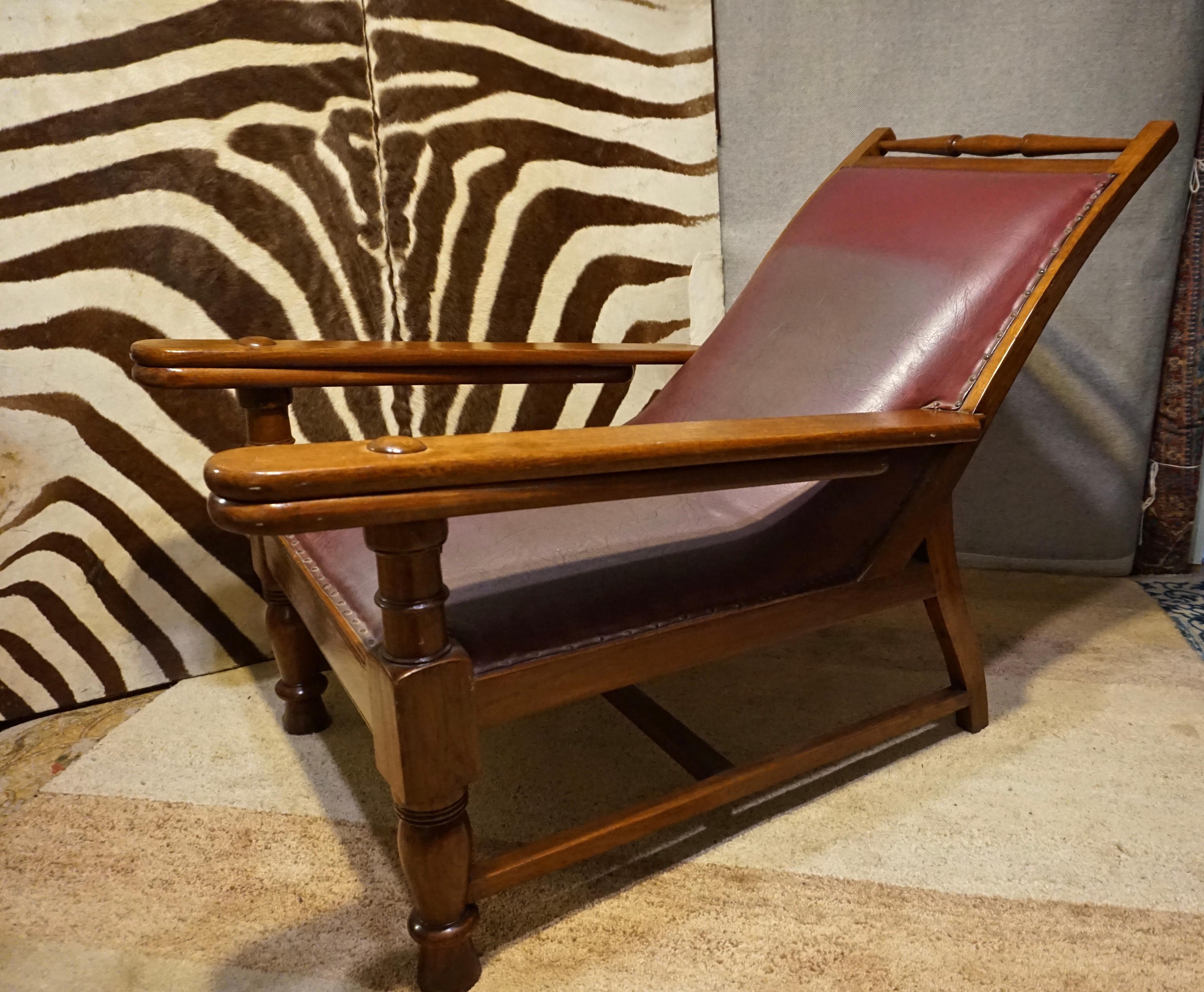 Circa 1890

Rare Teak and leather lounge chair that was formerly used in a Tea Estate in India. Hand made with pull out leaves that transform into leg rests and can be tucked back under the arms. Exceptionally conceived and with old leather sun