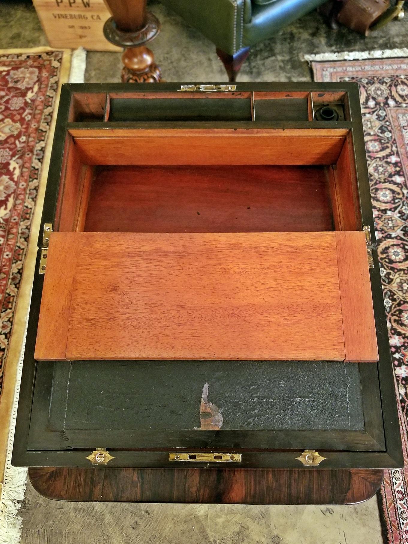 Made for campaign purpose, circa 1860 banded in brass for safe carriage.
Lovely red flamed Cuban mahogany the brass medallion on the lid is unmarked so not yet personalised!

The interior is in its original condition the leather slope has some