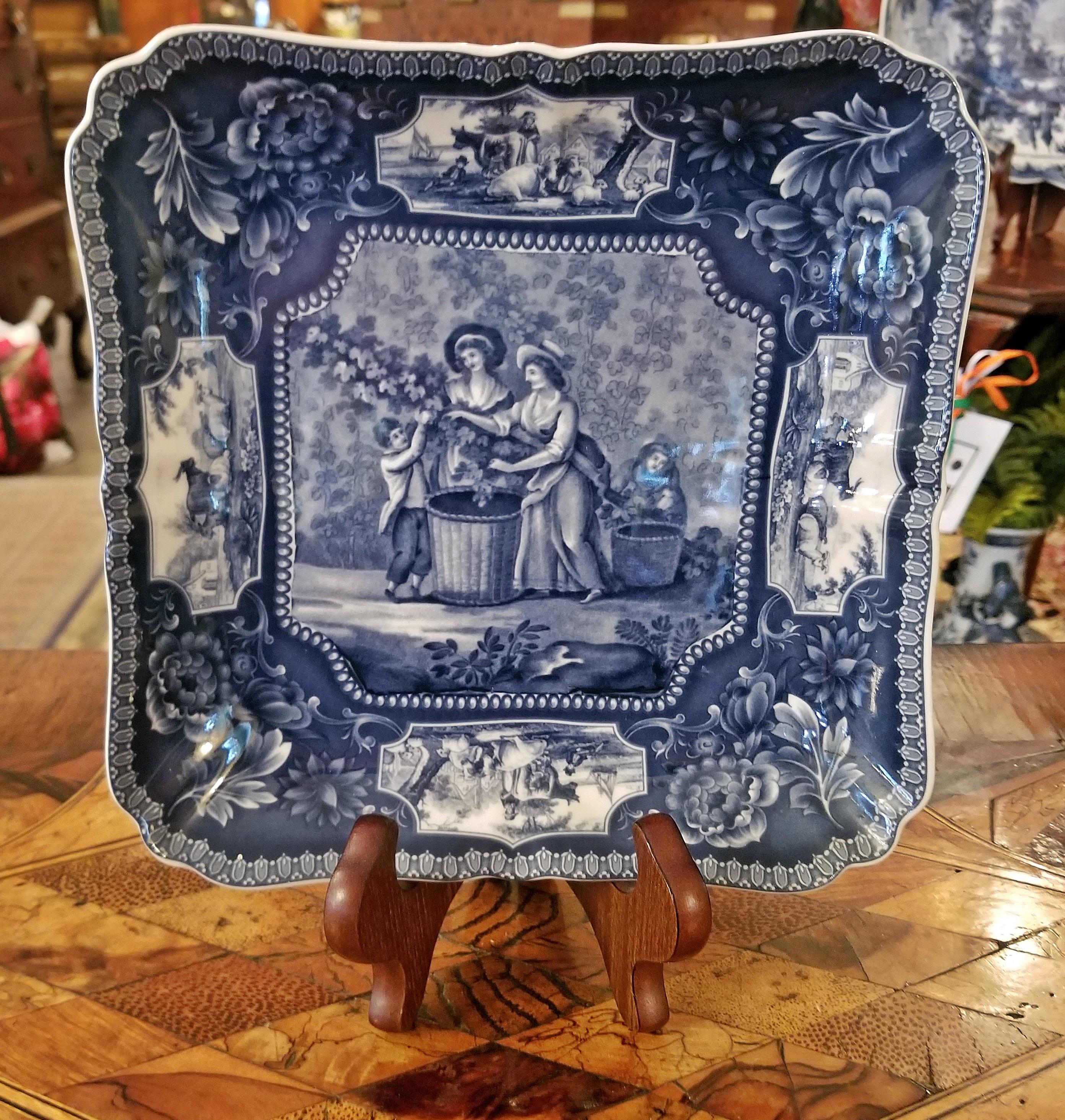 Lovely 19th century British Staffordshire pottery plaque from circa 1860.

Square shaped with raised edges and curved corners.

This plate/plaque can be used as a bon bon dish …… due to its depth.

Transfer printed…..central scene of ladies