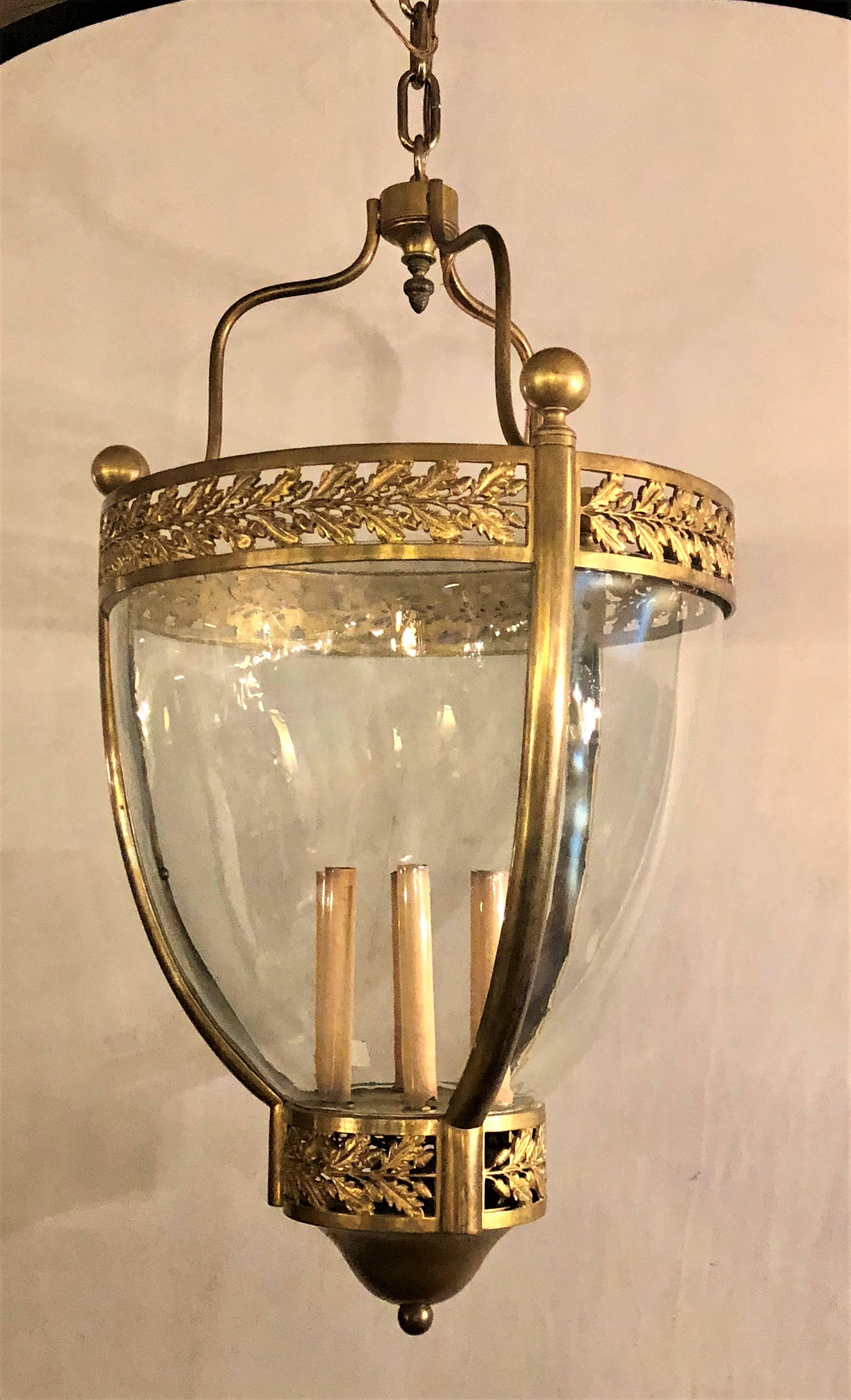 A 19th century bronze and glass bell jar large chandelier. Chain is 6 feet long.