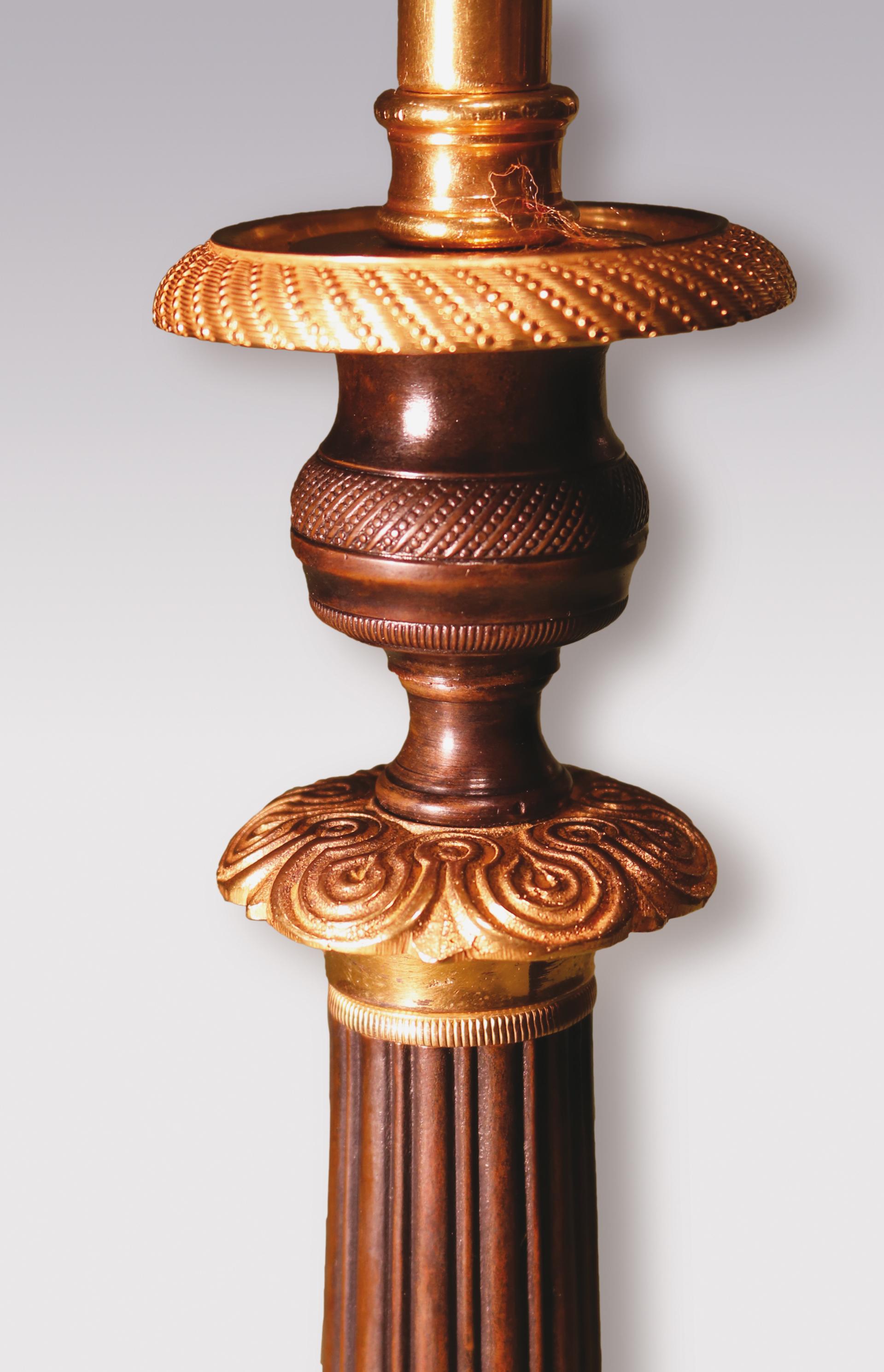 English 19th Century Bronze and Ormolu Candlesticks with Circular Bases