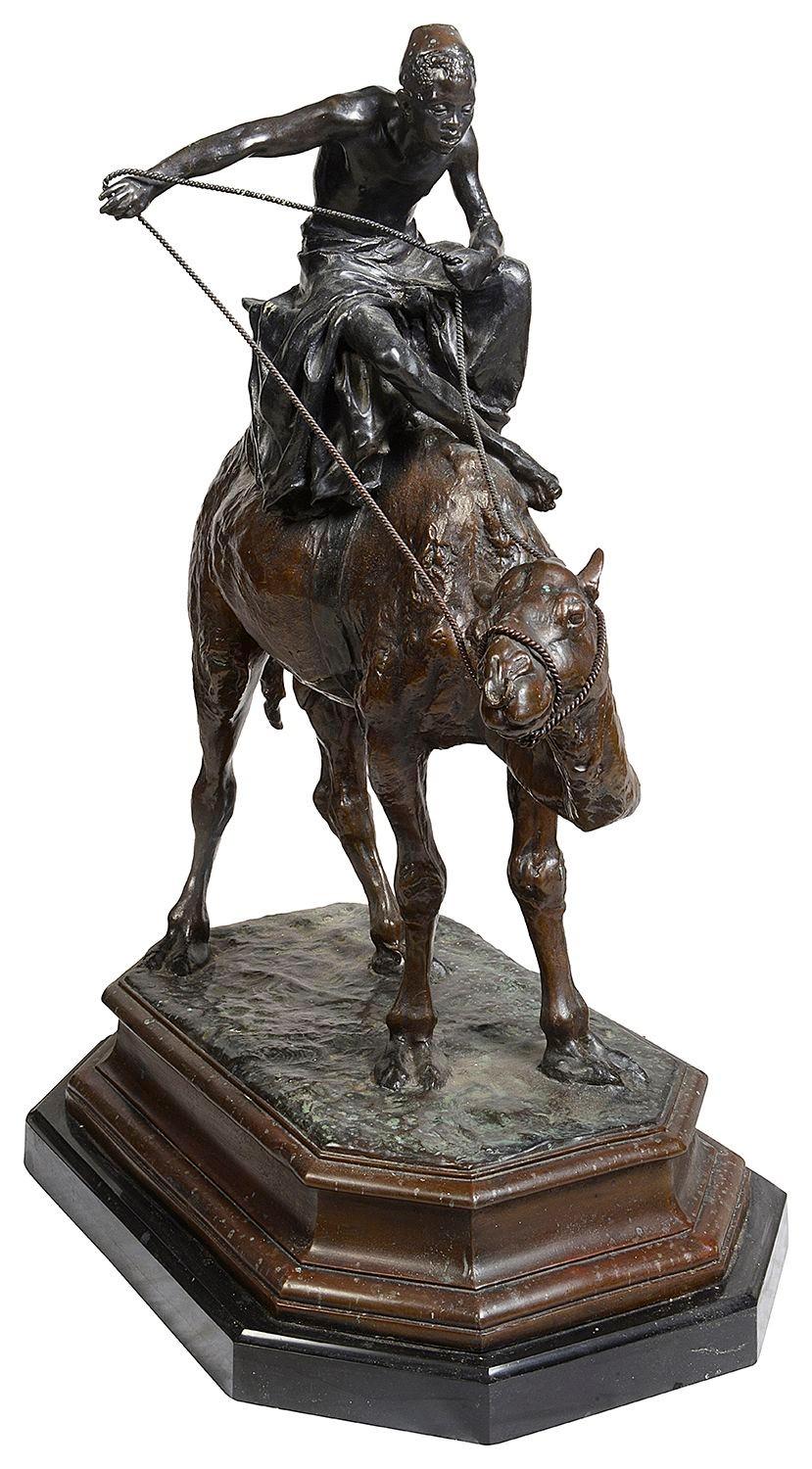 Un impressionante arabo in bronzo brevettato del XIX secolo che cavalca un cammello, 1860-80 circa.

Lotto 78 62290 DNKZZ