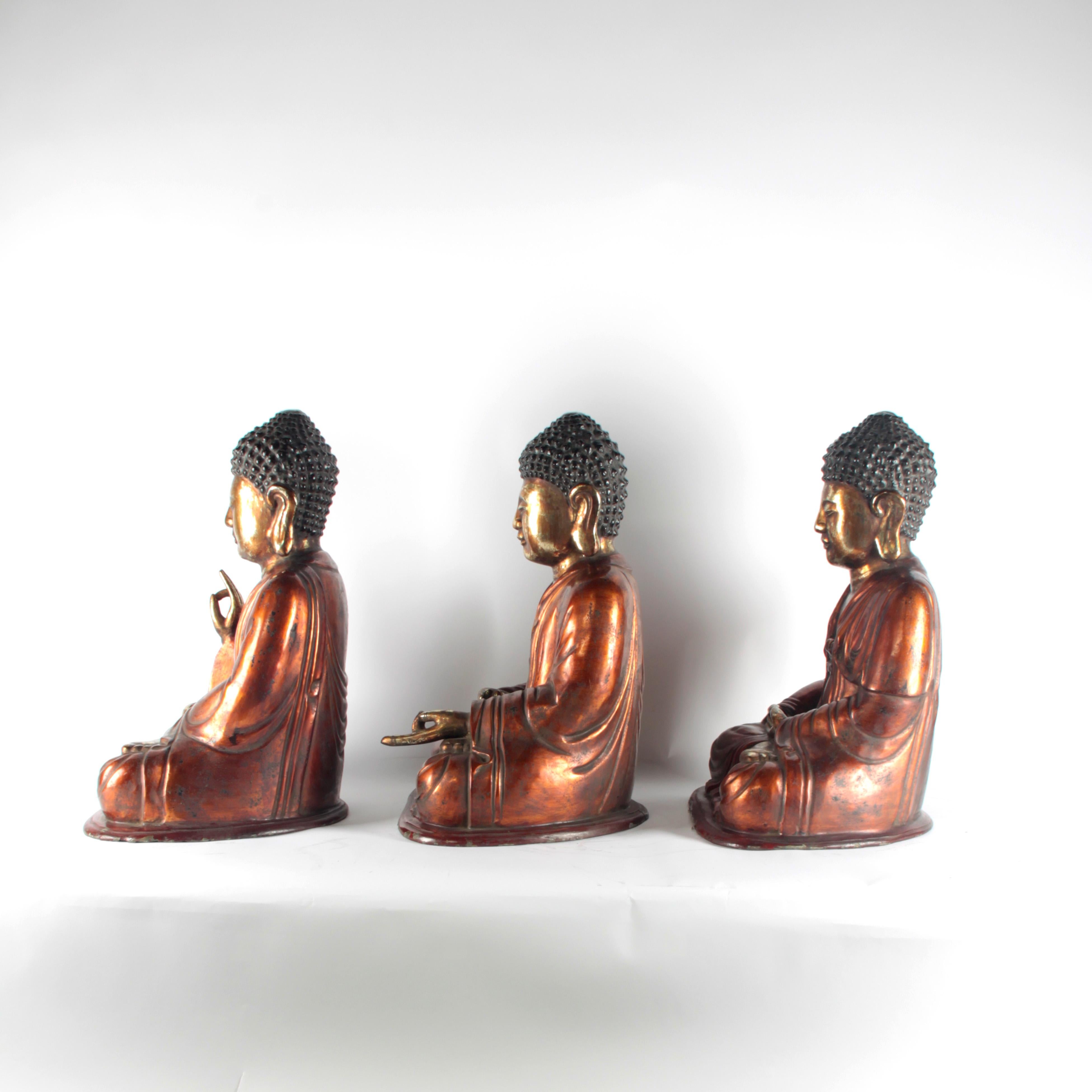 19th century bronze Asian Buddhas, Vietnam
Gold lacquer.
   