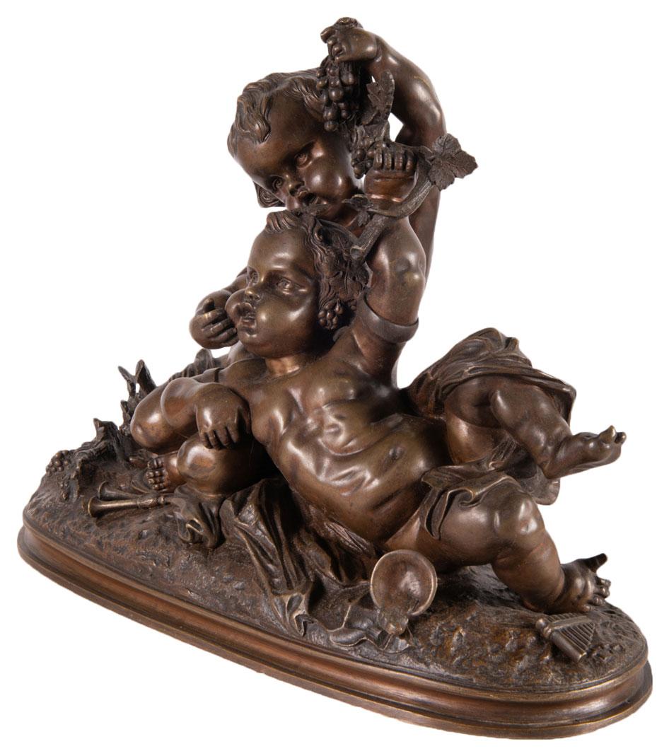 Romantic 19th Century Bronze Bacchus Group of Two Putti Playing with Grapes For Sale