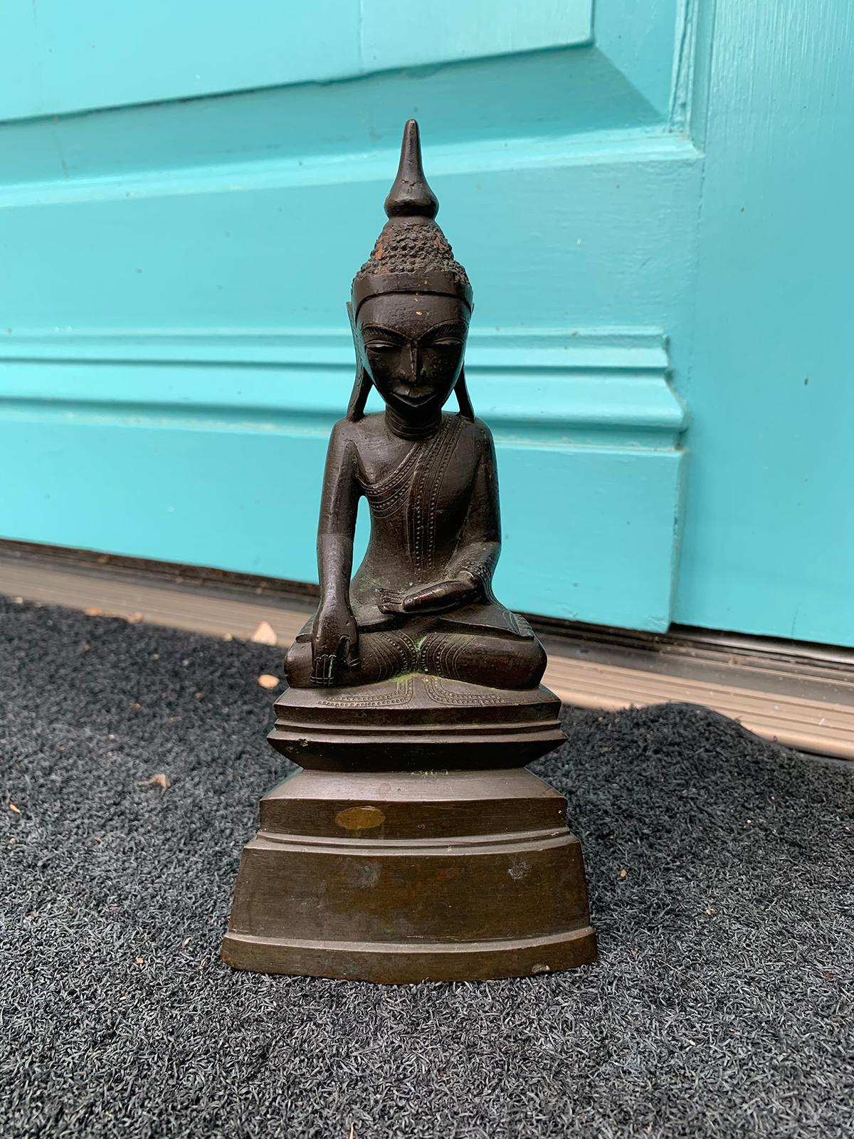 19th century bronze Buddha in lotus position.