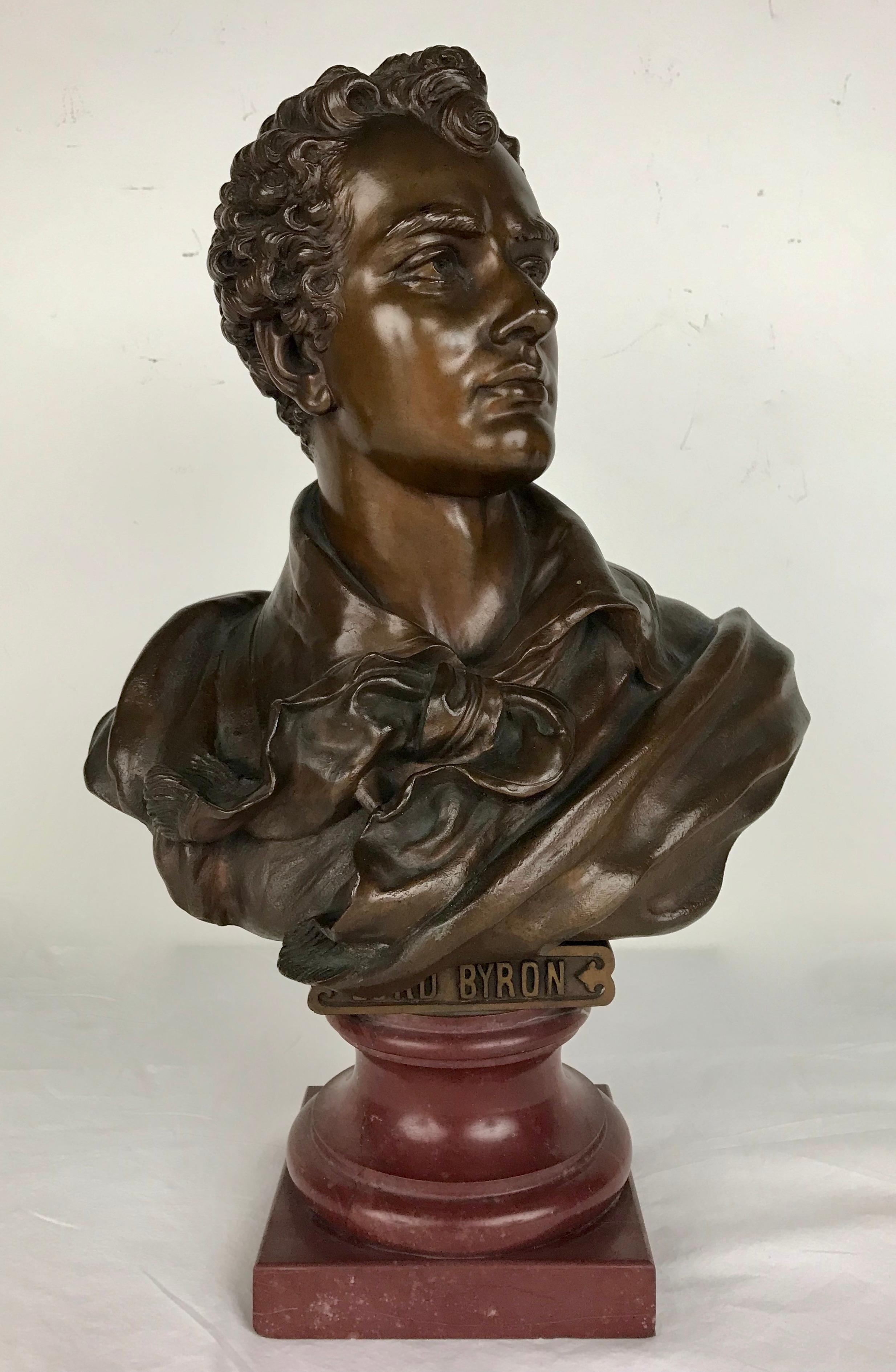 This bronze bust of Lord Byron is finely detailed and has a rich brown patina.
It is mounted on rouge marble base.