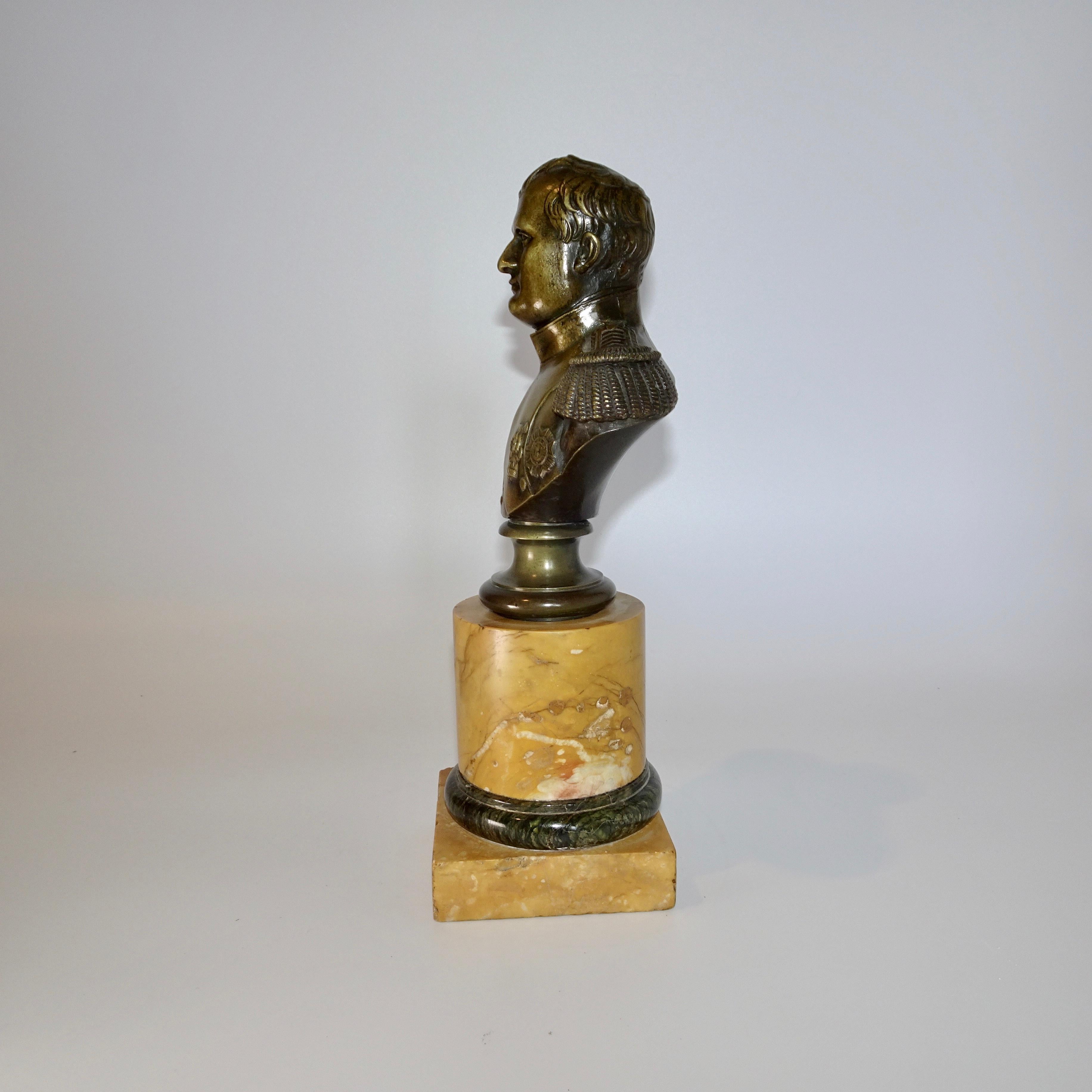 This is a 19th century bronze bust of Napoleon Bonaparte mounted on a beautiful yellow colored marble base. Napoleon Bonaparte was born August 15 1769 and died May 5 1821 Napoleon's campaigns are studied at military academies the world over. While