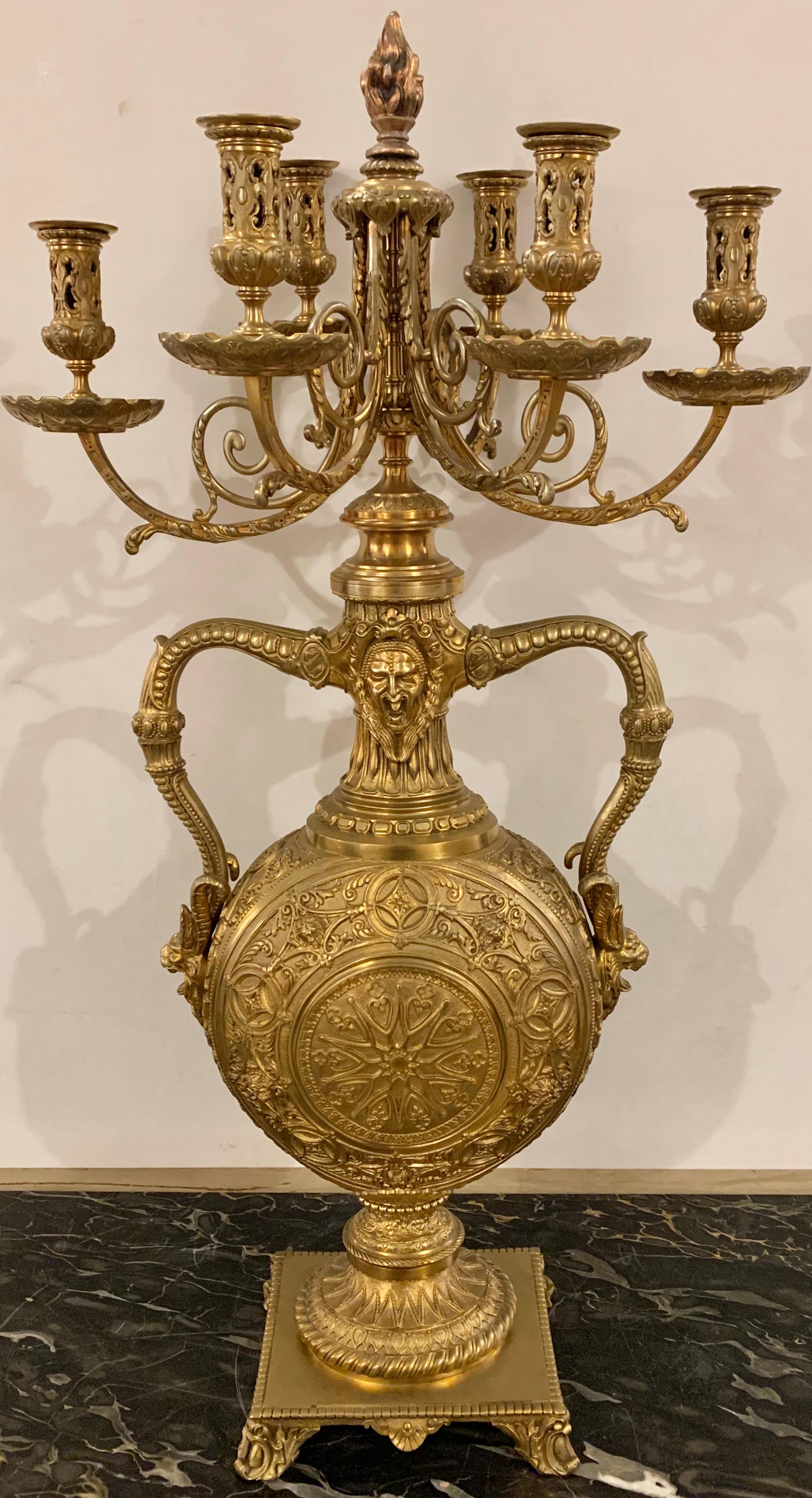19th century bronze candelabras Barbedienne, French stamped. A pair of spectacular monumental urn form antique candelabras each bearing horned animals and busts.

Greg.