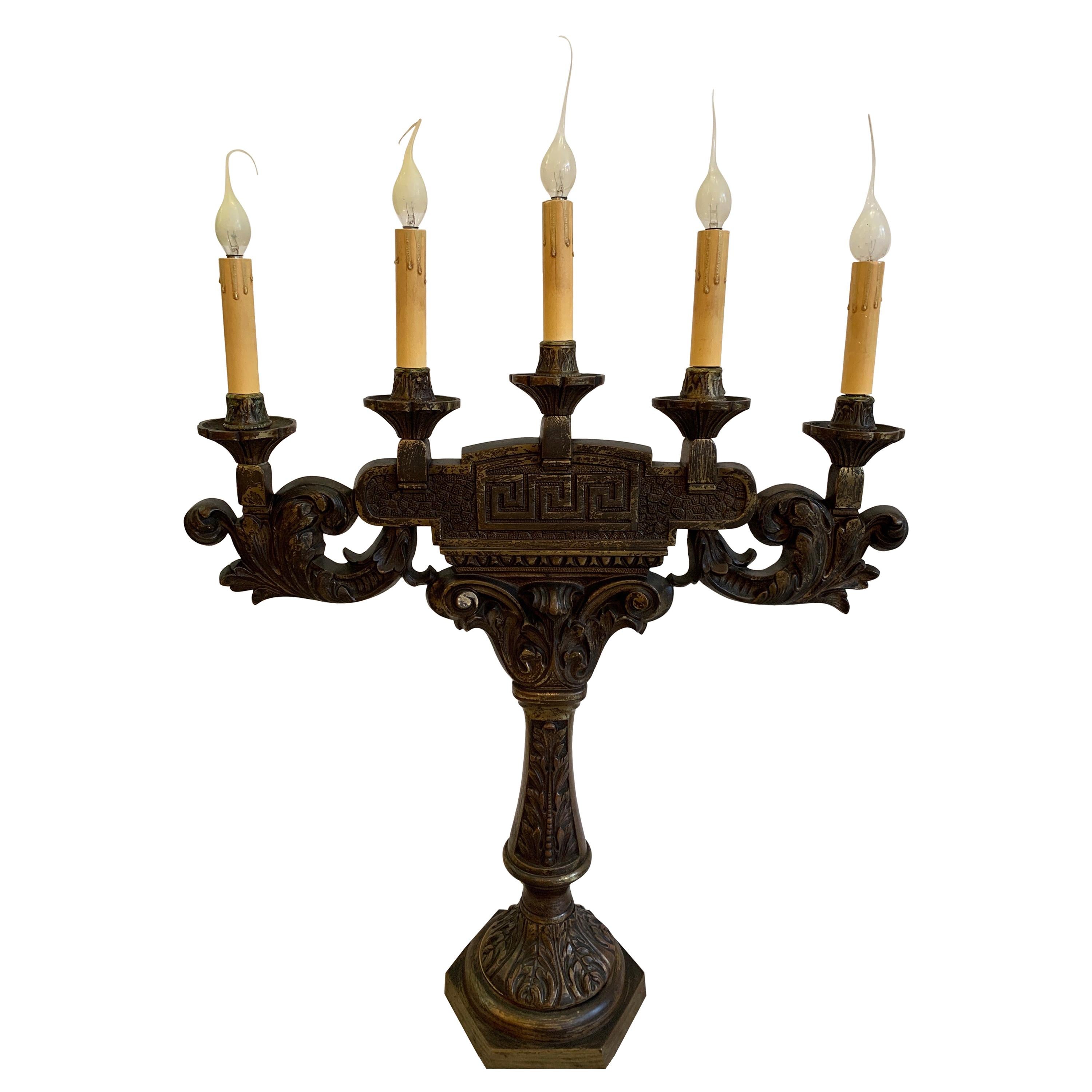 19th century bronze candelabras now electrified can be converted back to candles. Nice patination on bronze, heavy weight for stability. Back plates added. Great gothic/ medieval look.
Dimensions: 24
