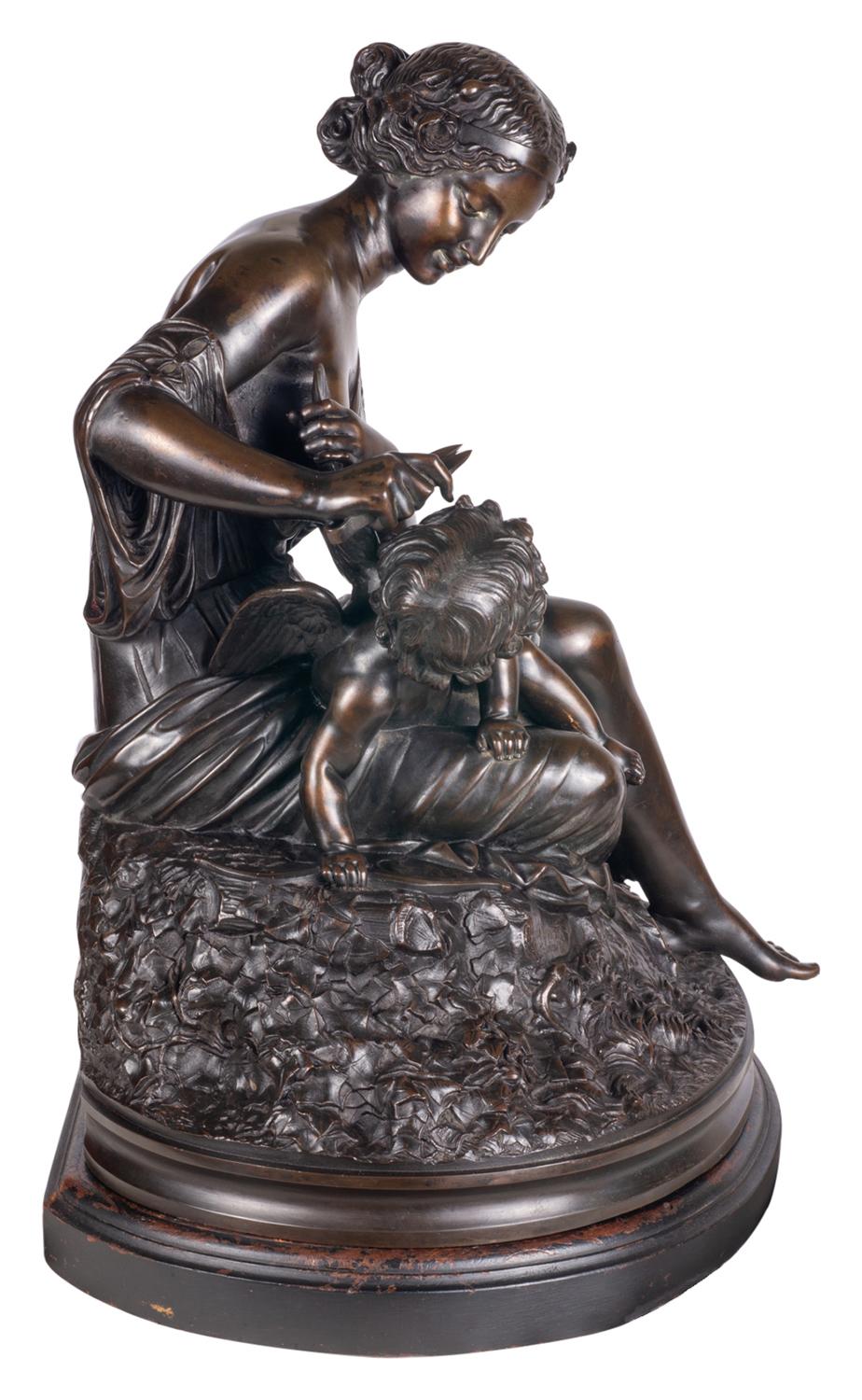 Patinated 19th Century Bronze Cherub Having His Wings Clipped, by Cumberworth For Sale