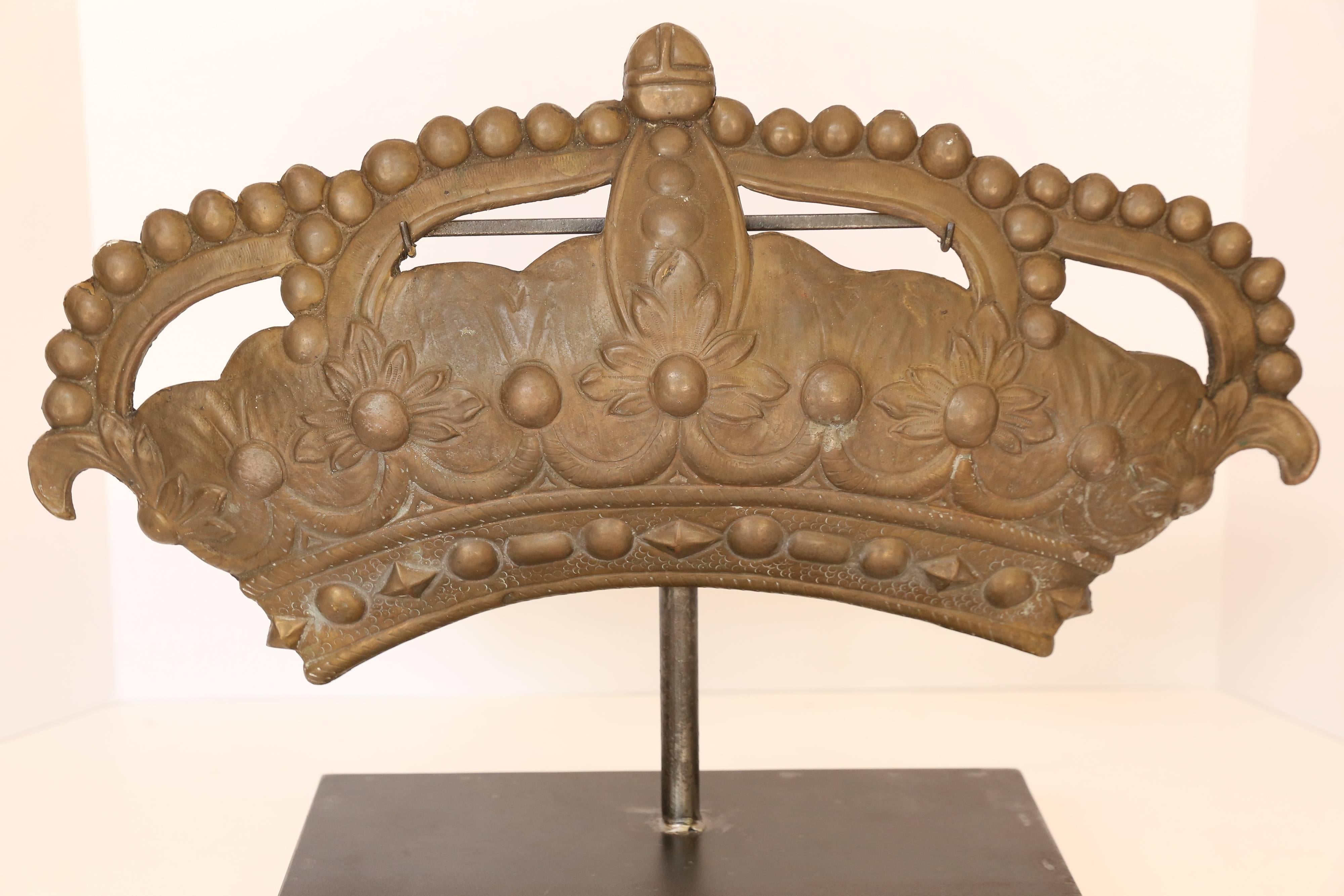 19th century bronze crown mold on custom iron stand.