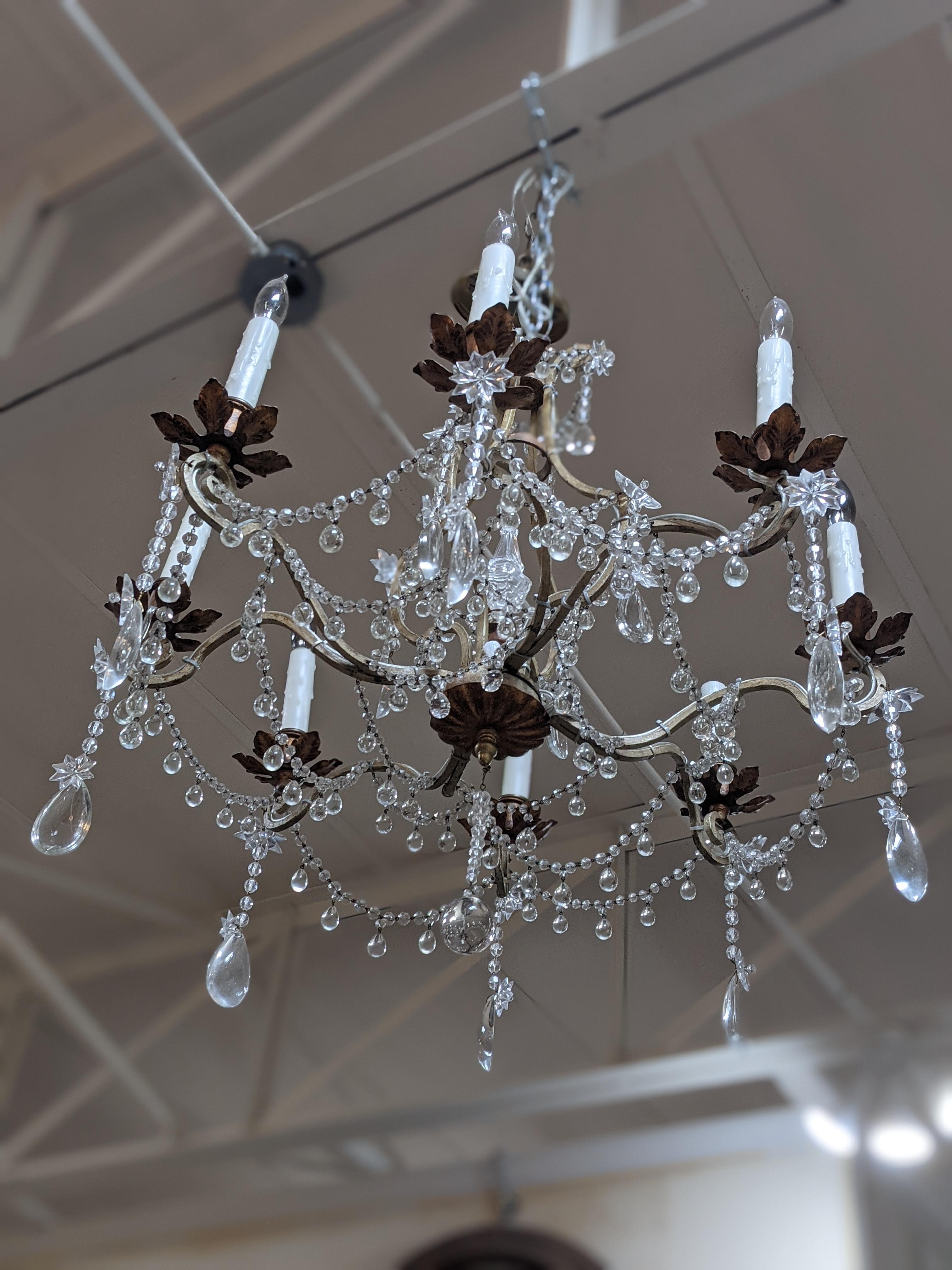 This bronze and crystal chandelier origins from France.

19th century period.